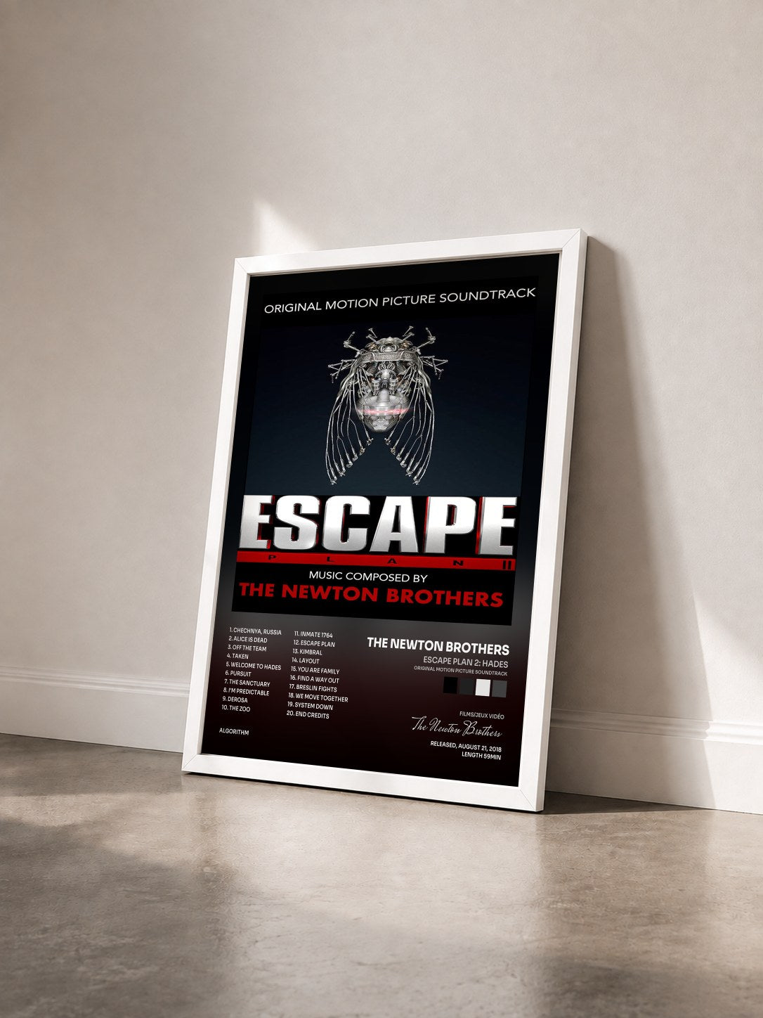 #blanc Tableau de l'album Escape Plan 2: Hades (Original Motion Picture Soundtrack) de The Newton Brothers vu de trois quarts, cadre blanc