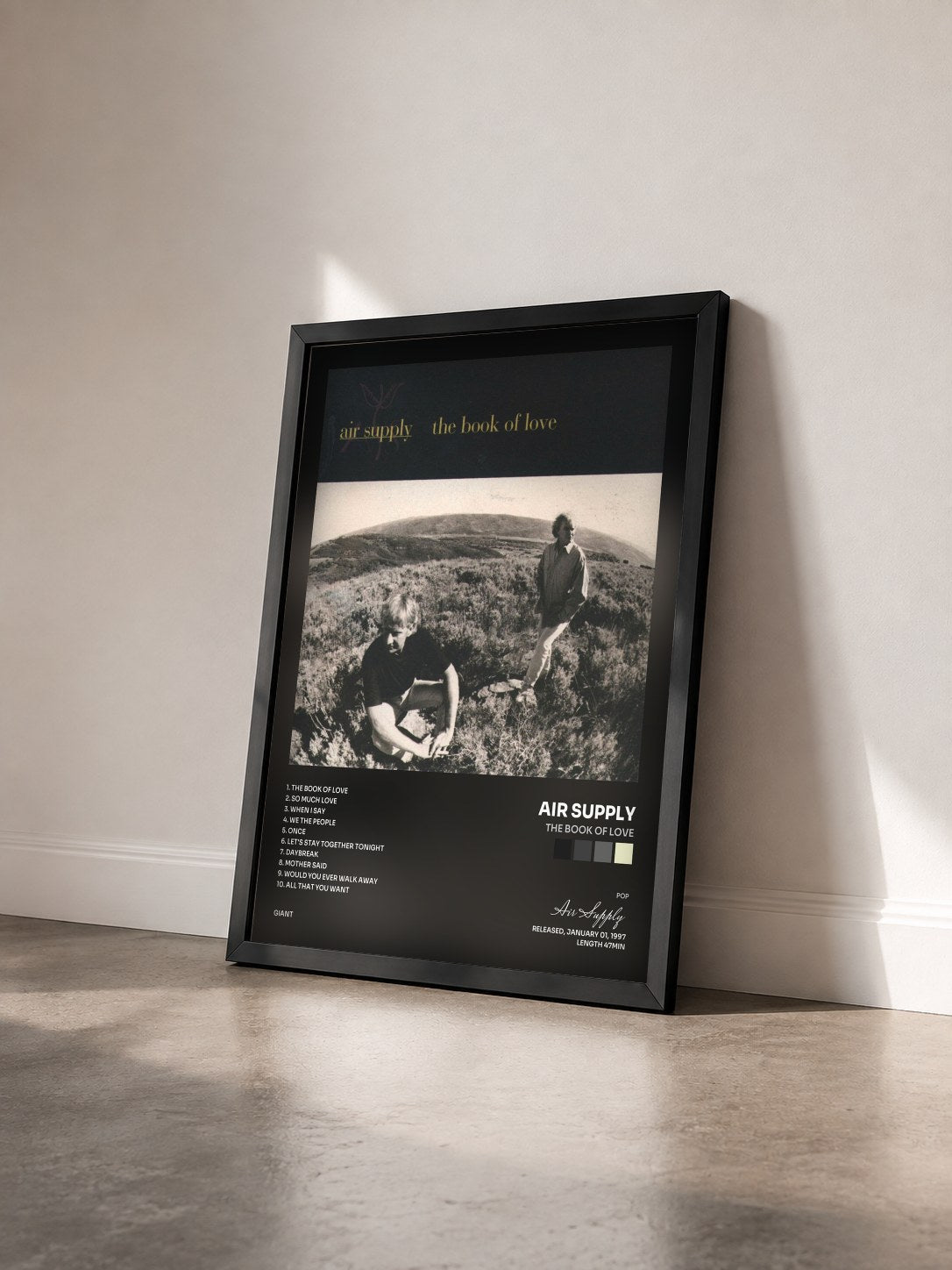 #noir The Book Of Love by Air Supply as a framed art print seen at an angle, black frame