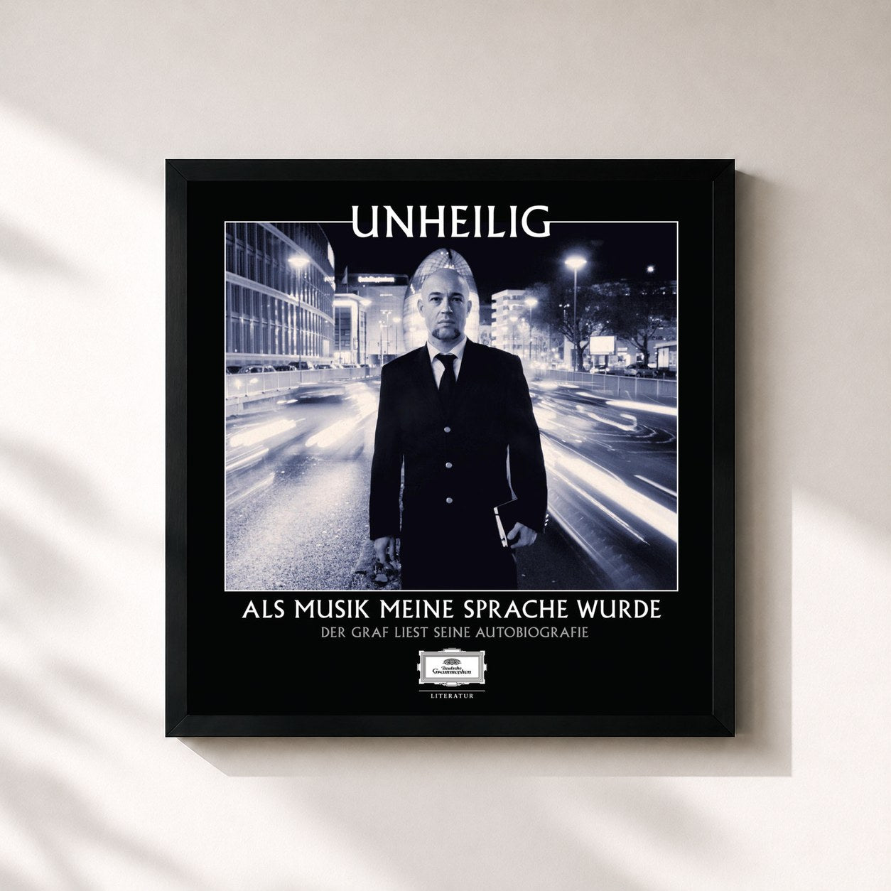 #noir Tableau carré de l'album Als Musik meine Sprache wurde - Der Graf liest seine Autobiografie (Ungekürzt) de Unheilig, cadre noir 32x32 cm