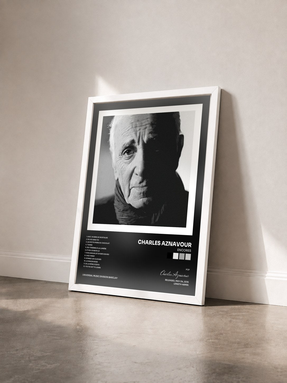 #blanc Tableau de l'album Encores de Charles Aznavour vu de trois quarts, cadre blanc