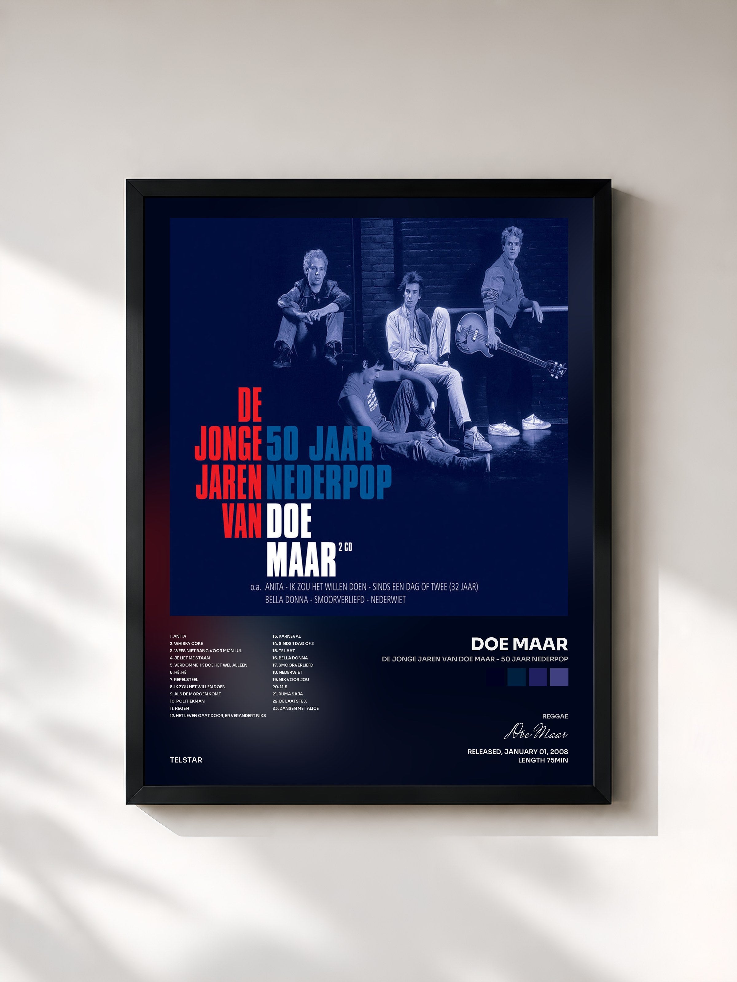 #noir Tableau de l'album De Jonge Jaren van Doe Maar - 50 jaar Nederpop de Doe Maar, cadre noir, imprimé et encadré en France