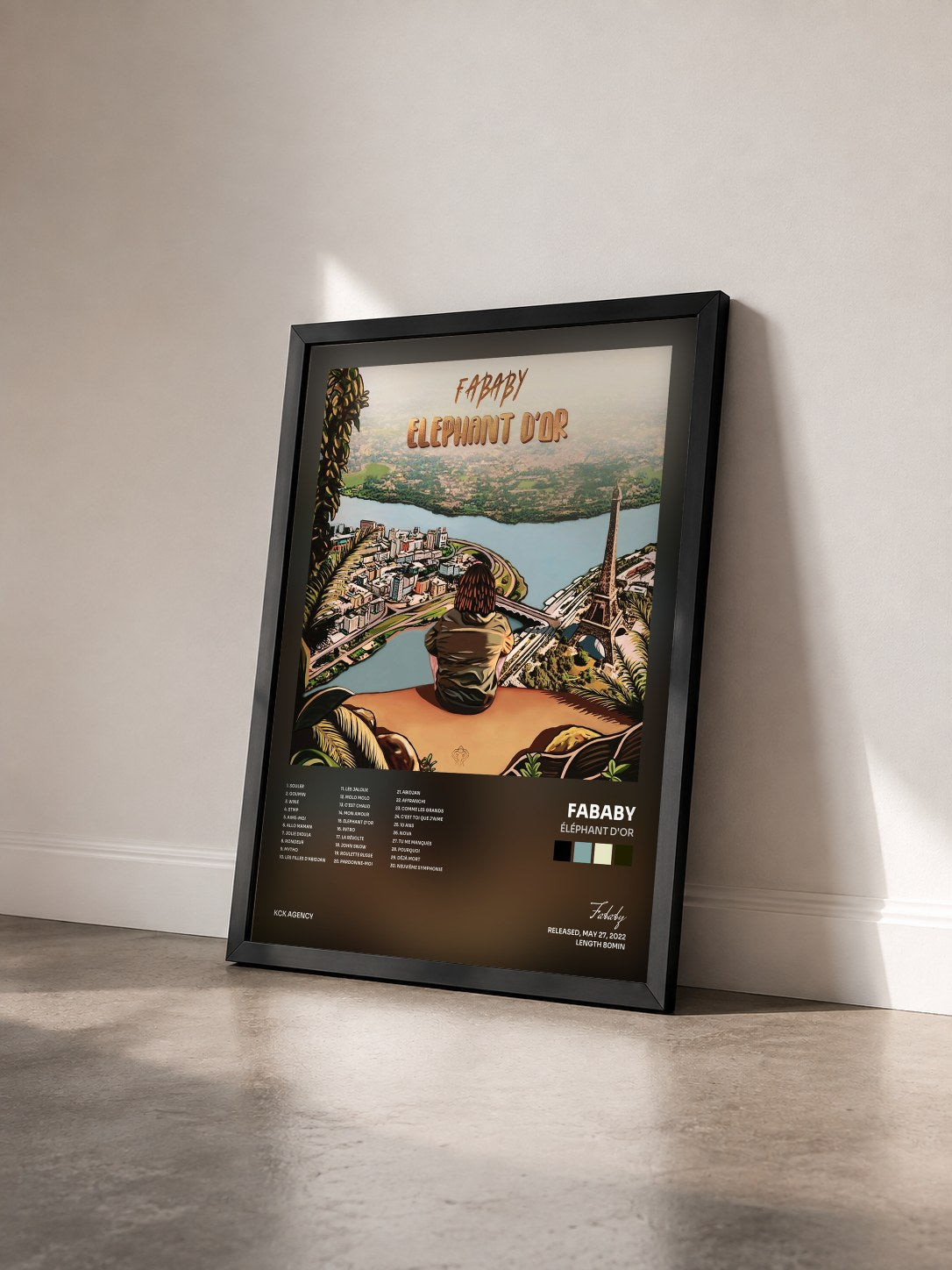 #noir Éléphant d'or di Fababy in stampa incorniciata vista di tre quarti, cornice nera