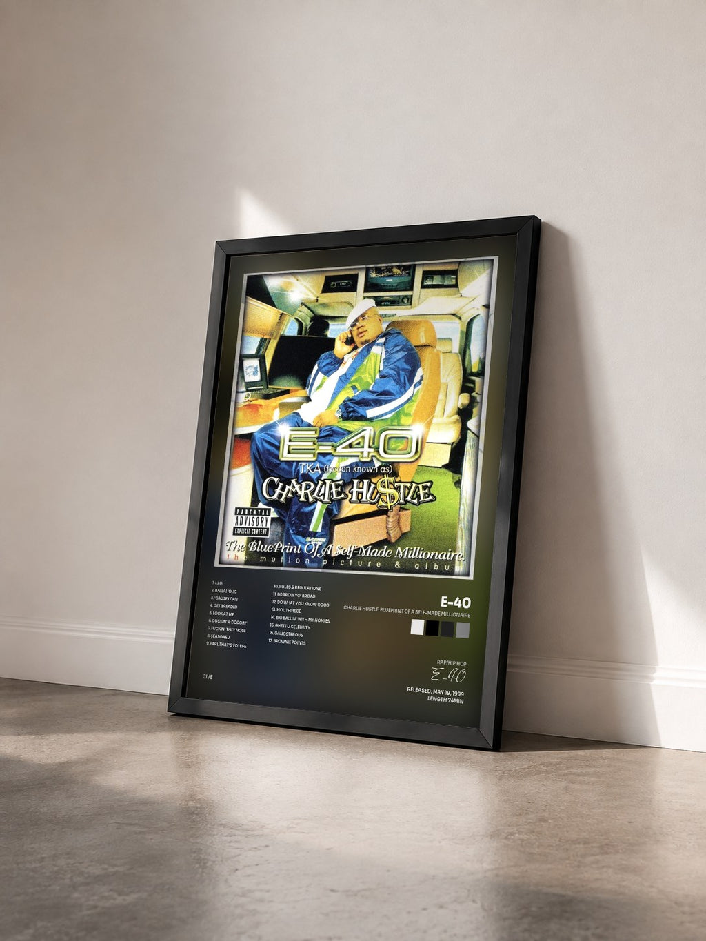#noir Tableau de l'album Charlie Hustle: Blueprint Of A Self-Made Millionaire de E-40 vu de trois quarts, cadre noir
