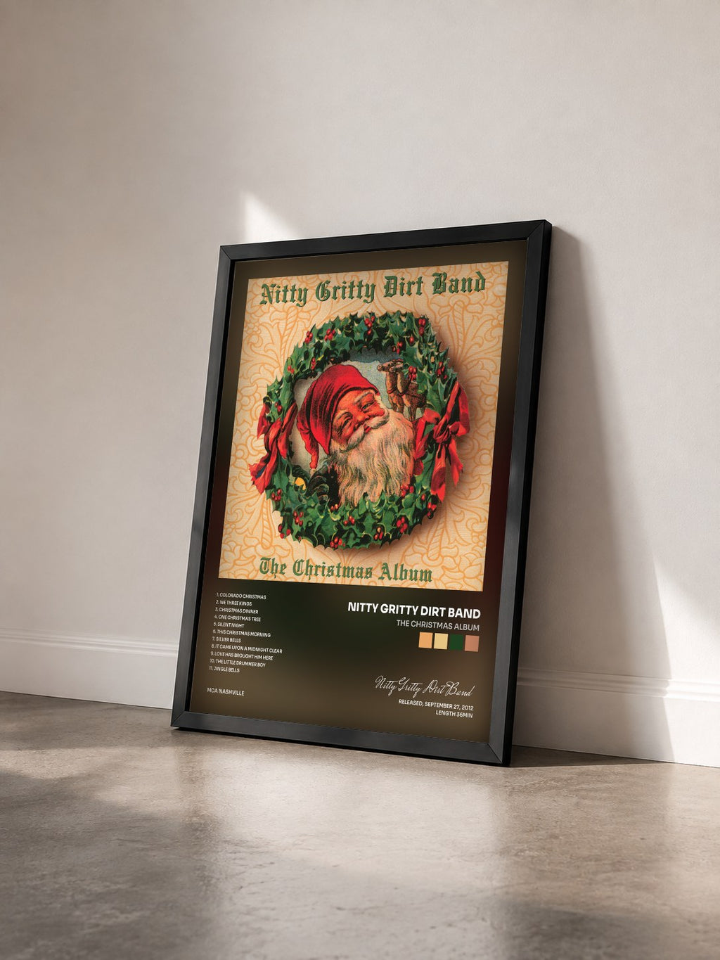 #noir Tableau de l'album The Christmas Album de Nitty Gritty Dirt Band vu de trois quarts, cadre noir