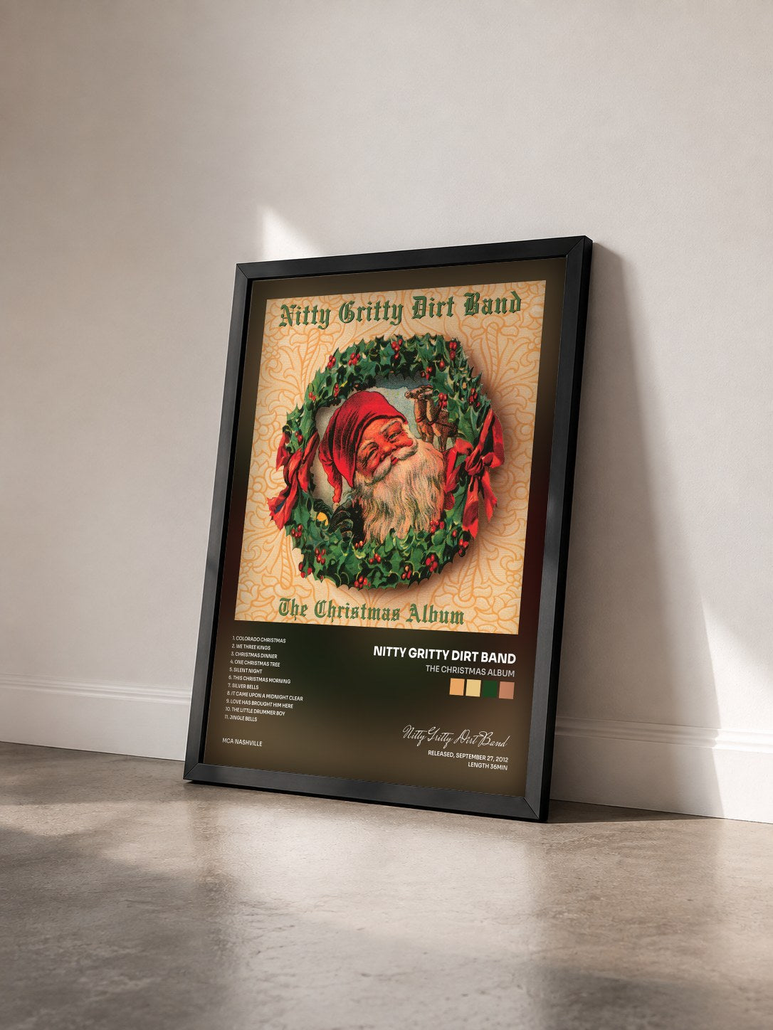 #noir Tableau de l'album The Christmas Album de Nitty Gritty Dirt Band vu de trois quarts, cadre noir