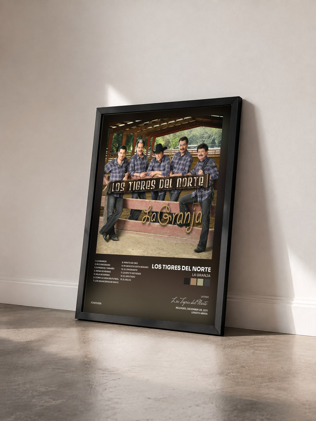 #noir Tableau de l'album La Granja de Los Tigres del Norte vu de trois quarts, cadre noir