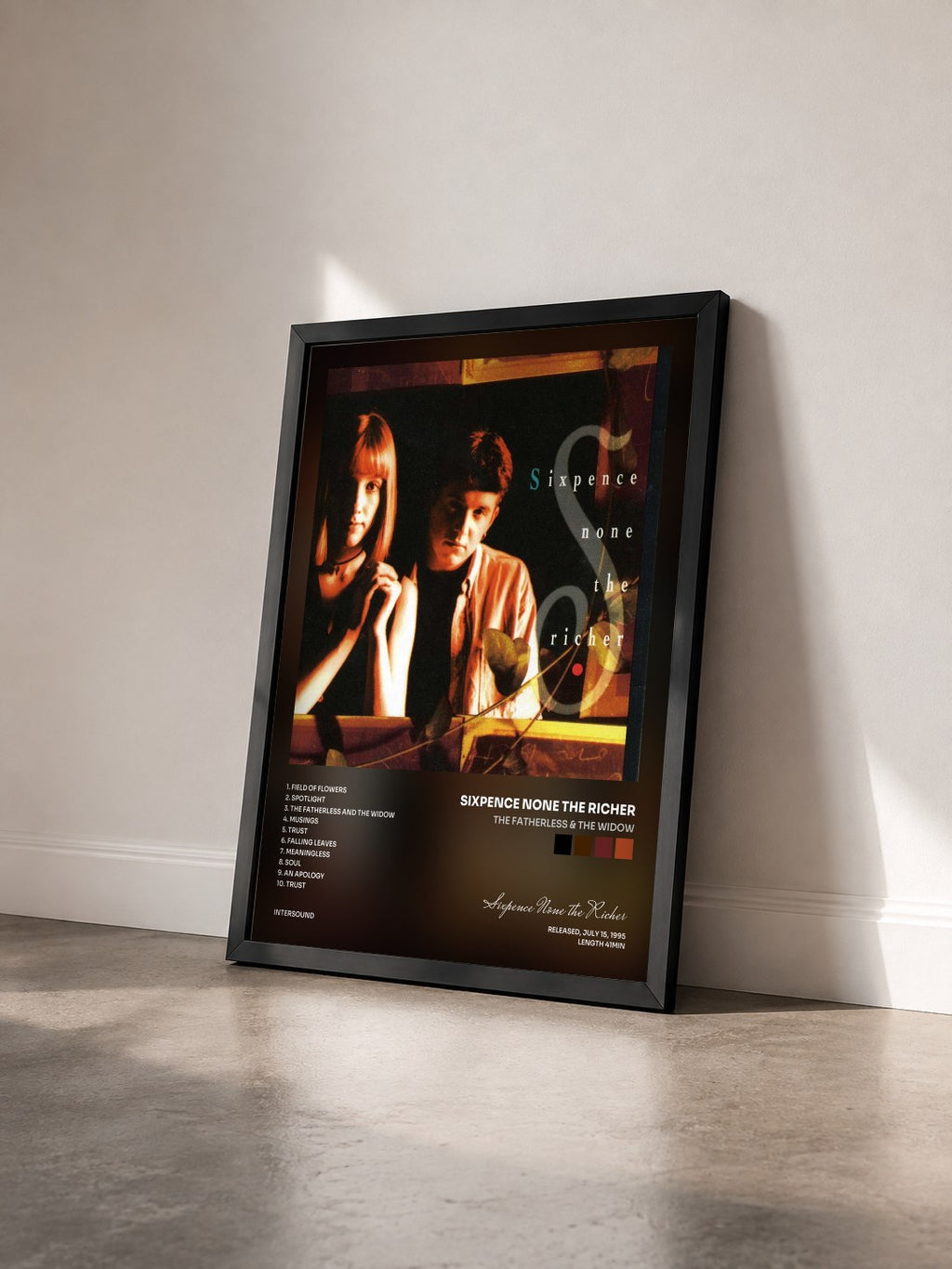 #noir Tableau de l'album The Fatherless & The Widow de Sixpence None the Richer vu de trois quarts, cadre noir