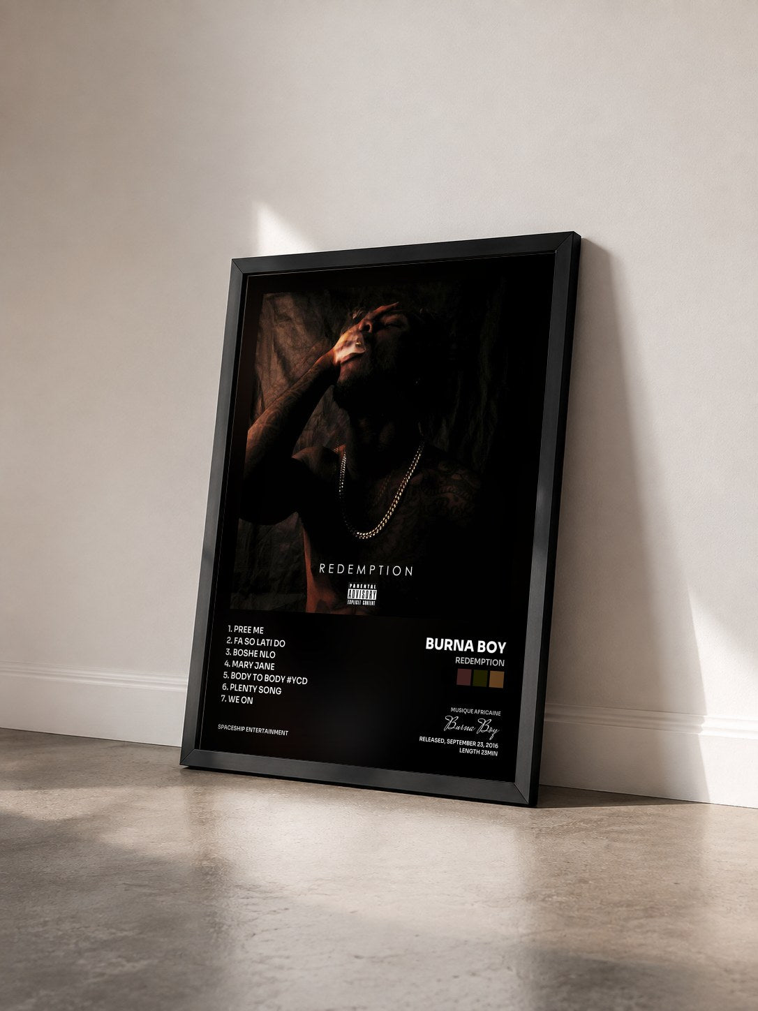 #noir Tableau de l'album Redemption de Burna Boy vu de trois quarts, cadre noir