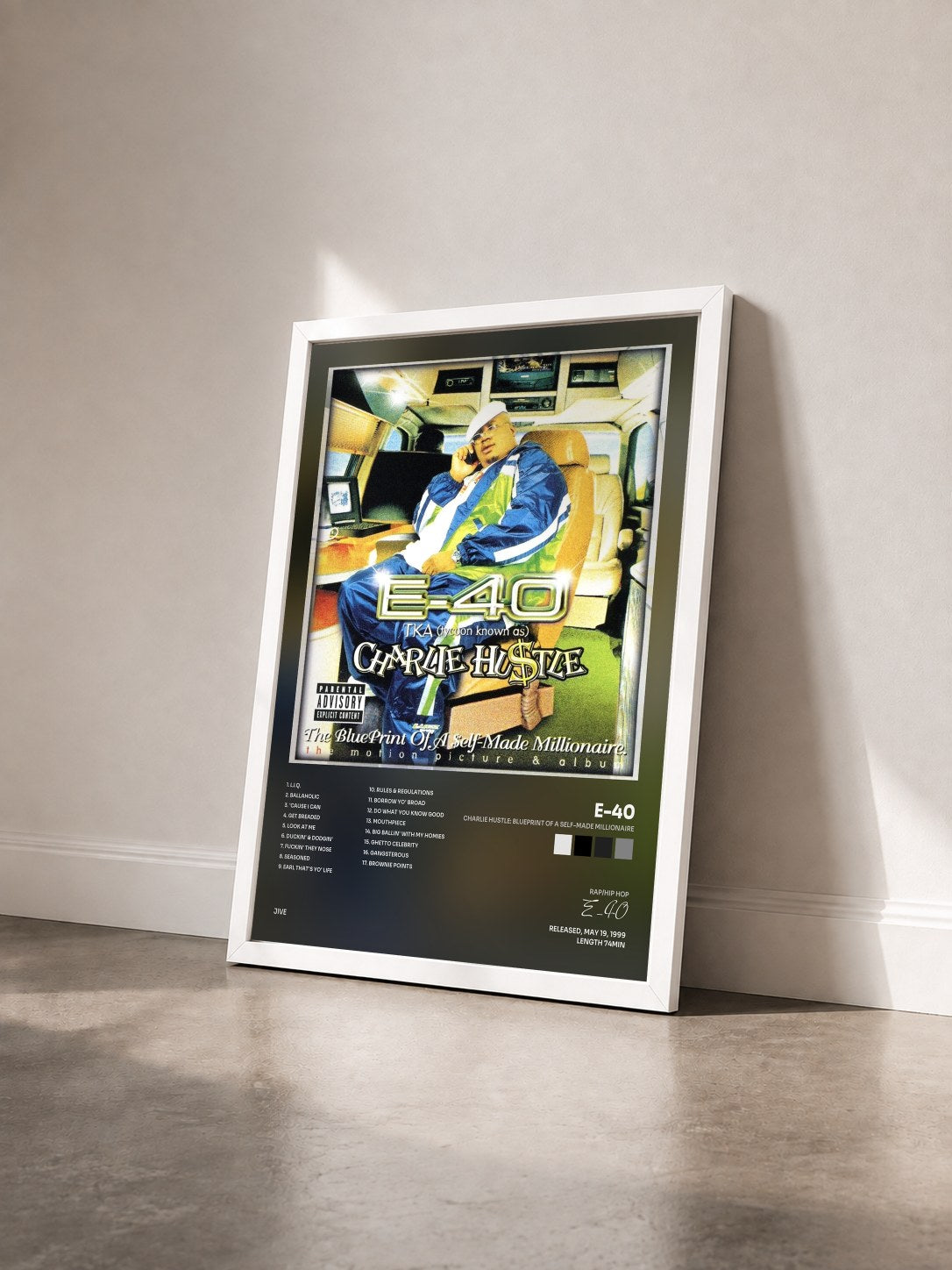 #blanc Tableau de l'album Charlie Hustle: Blueprint Of A Self-Made Millionaire de E-40 vu de trois quarts, cadre blanc