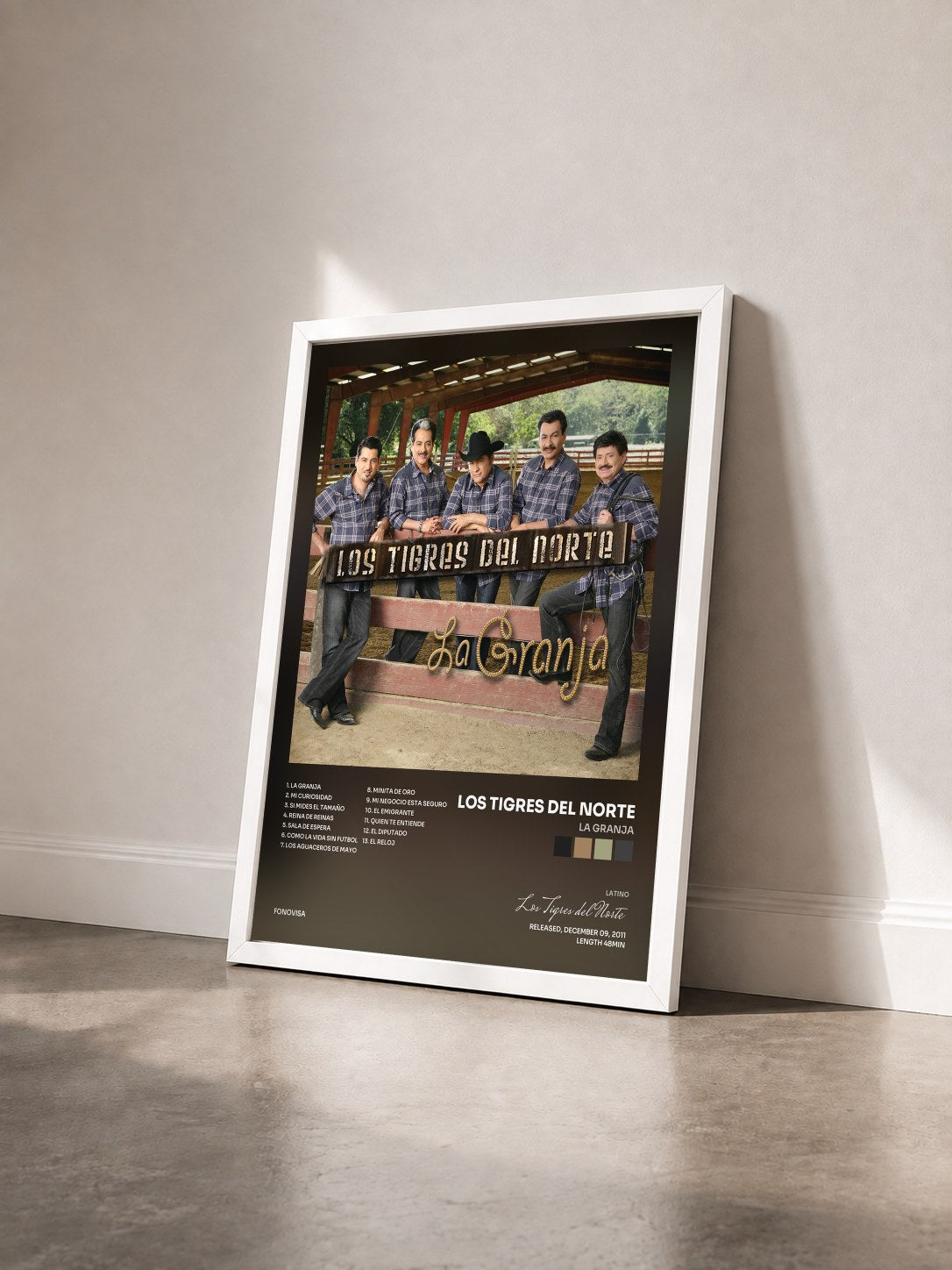 #blanc Tableau de l'album La Granja de Los Tigres del Norte vu de trois quarts, cadre blanc