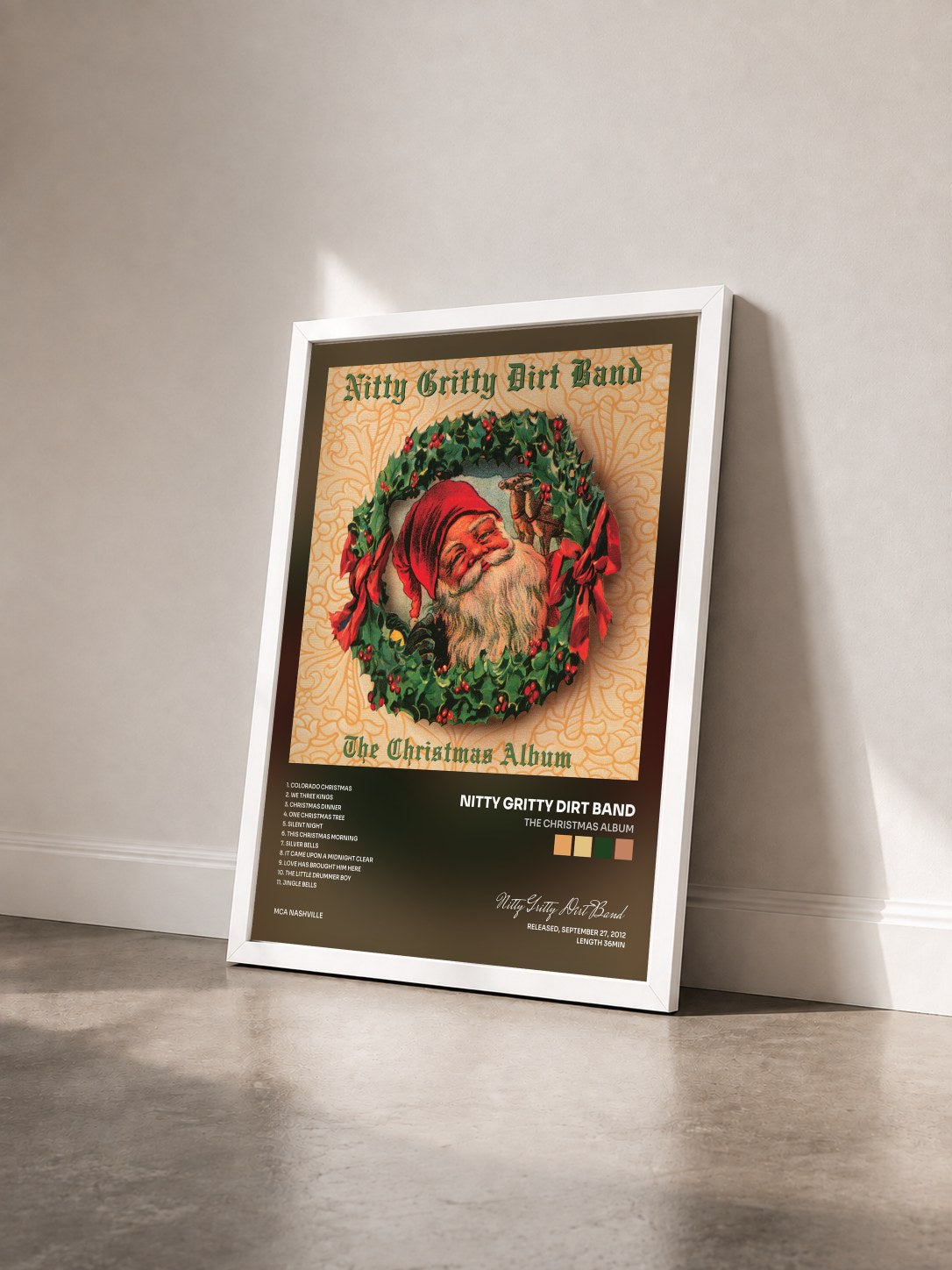 #blanc Tableau de l'album The Christmas Album de Nitty Gritty Dirt Band vu de trois quarts, cadre blanc