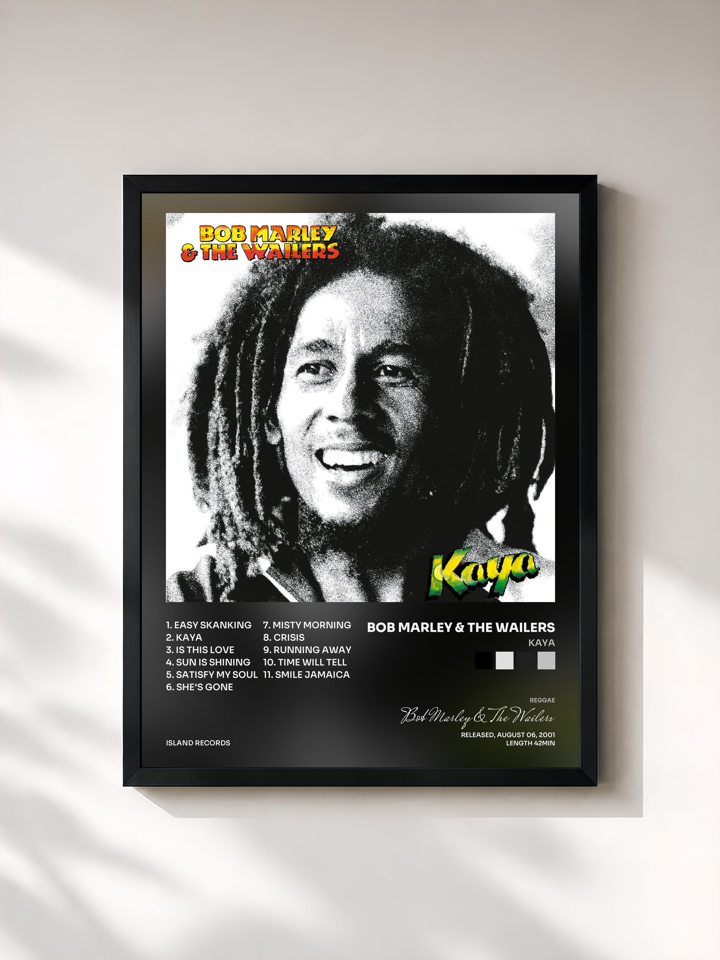 #noir Kaya by Bob Marley & The Wailers as a framed art print, black frame, printed and framed in France