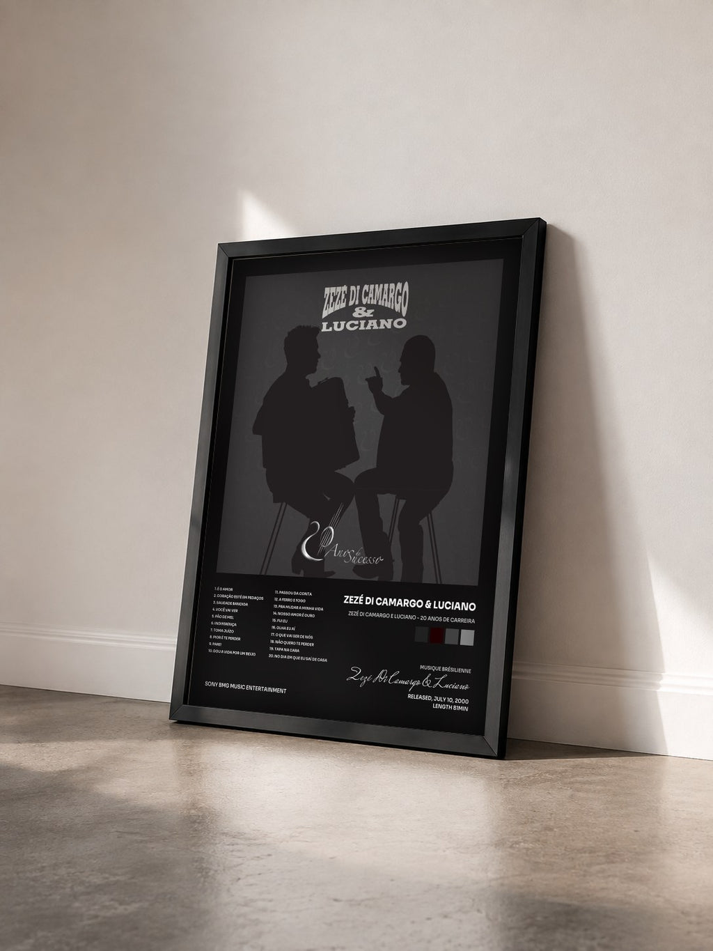 #noir Tableau de l'album Zezé Di Camargo e Luciano - 20 Anos de Carreira de Zezé Di Camargo & Luciano vu de trois quarts, cadre noir
