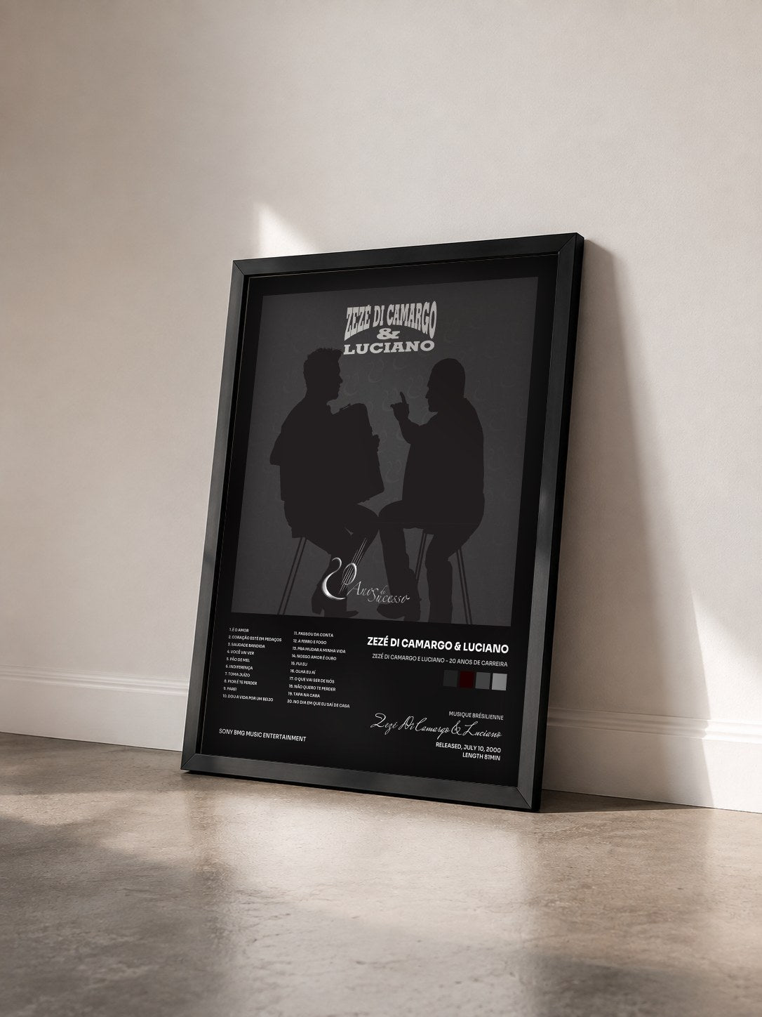 #noir Tableau de l'album Zezé Di Camargo e Luciano - 20 Anos de Carreira de Zezé Di Camargo & Luciano vu de trois quarts, cadre noir