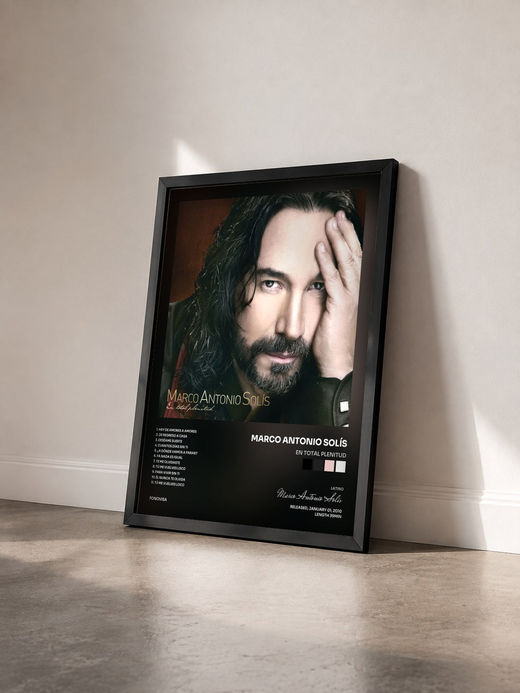 #noir Tableau de l'album En Total Plenitud de Marco Antonio Solís vu de trois quarts, cadre noir