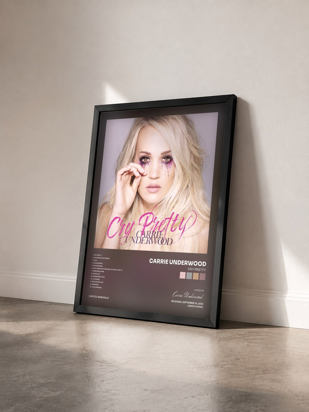 #noir Tableau de l'album Cry Pretty de Carrie Underwood vu de trois quarts, cadre noir