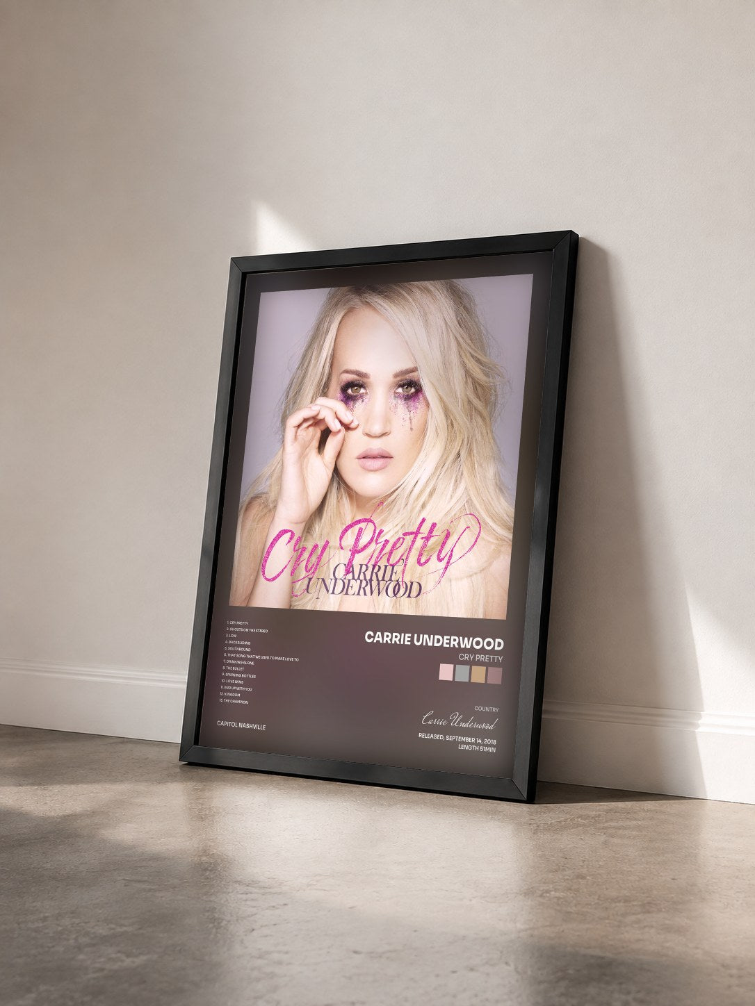 #noir Tableau de l'album Cry Pretty de Carrie Underwood vu de trois quarts, cadre noir