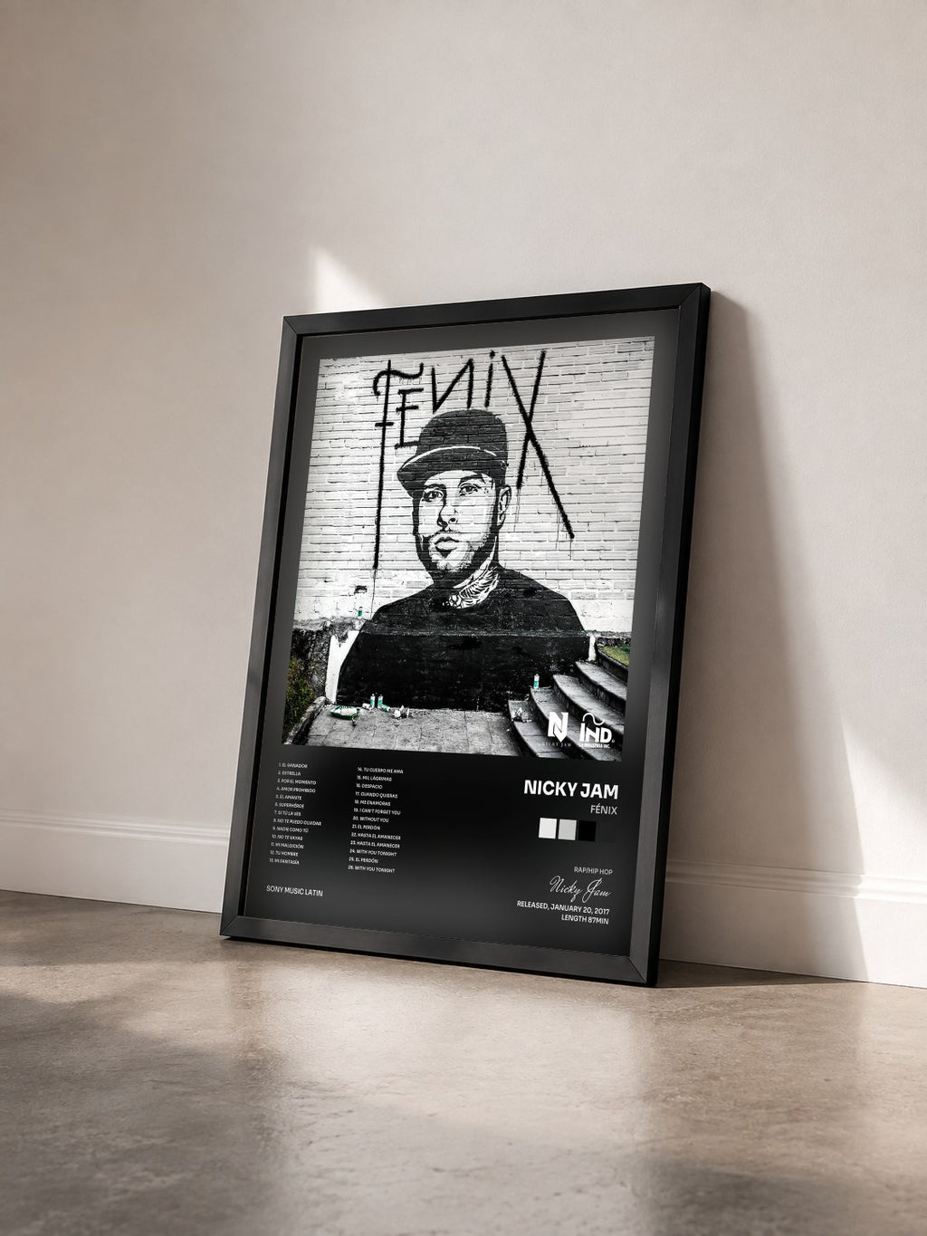 #noir Tableau de l'album Fénix de Nicky Jam vu de trois quarts, cadre noir