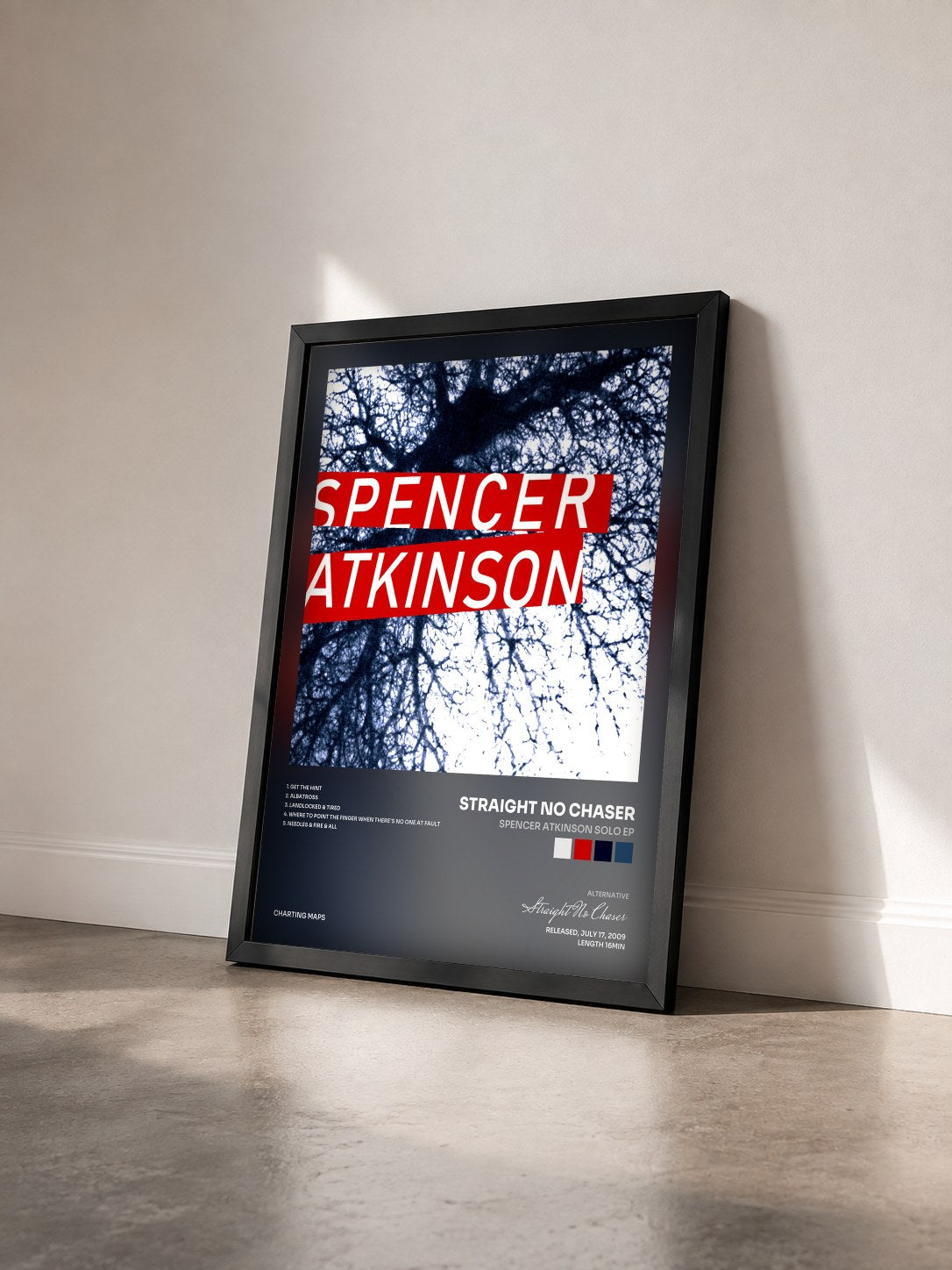 #noir Tableau de l'album Spencer Atkinson Solo EP de Straight No Chaser vu de trois quarts, cadre noir