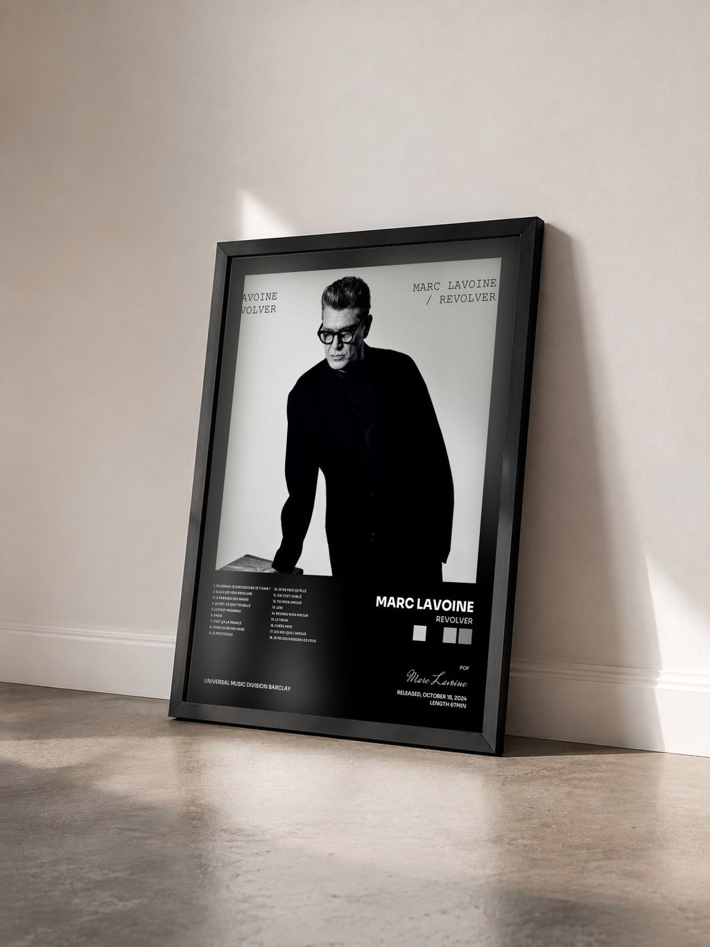 #noir Revolver by Marc Lavoine as a framed art print seen at an angle, black frame
