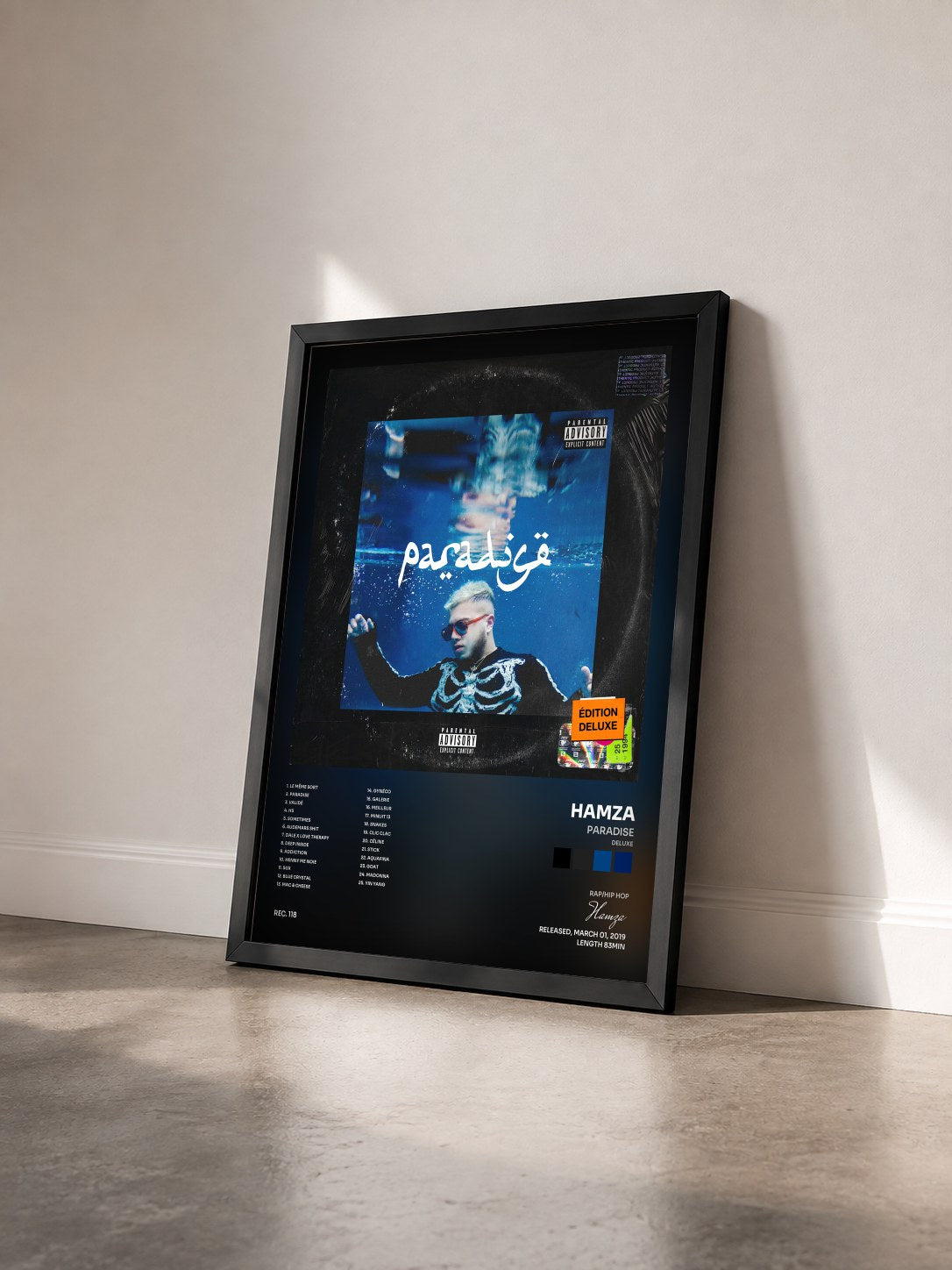 #noir Paradise (Deluxe) by Hamza as a framed art print seen at an angle, black frame
