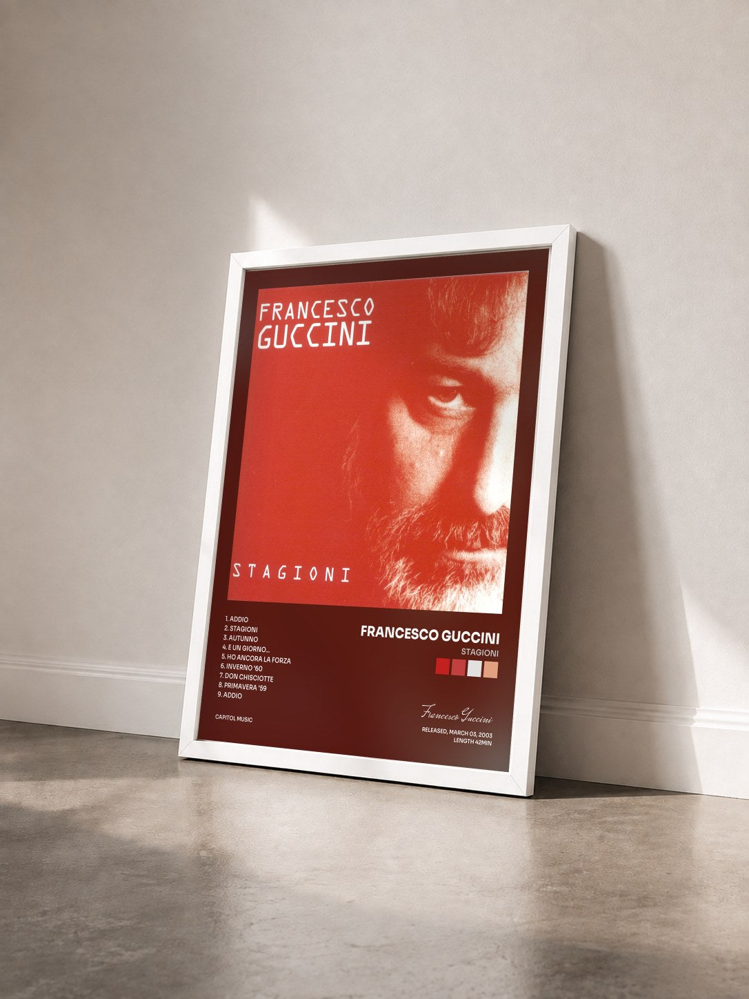 #blanc Tableau de l'album Stagioni de Francesco Guccini vu de trois quarts, cadre blanc