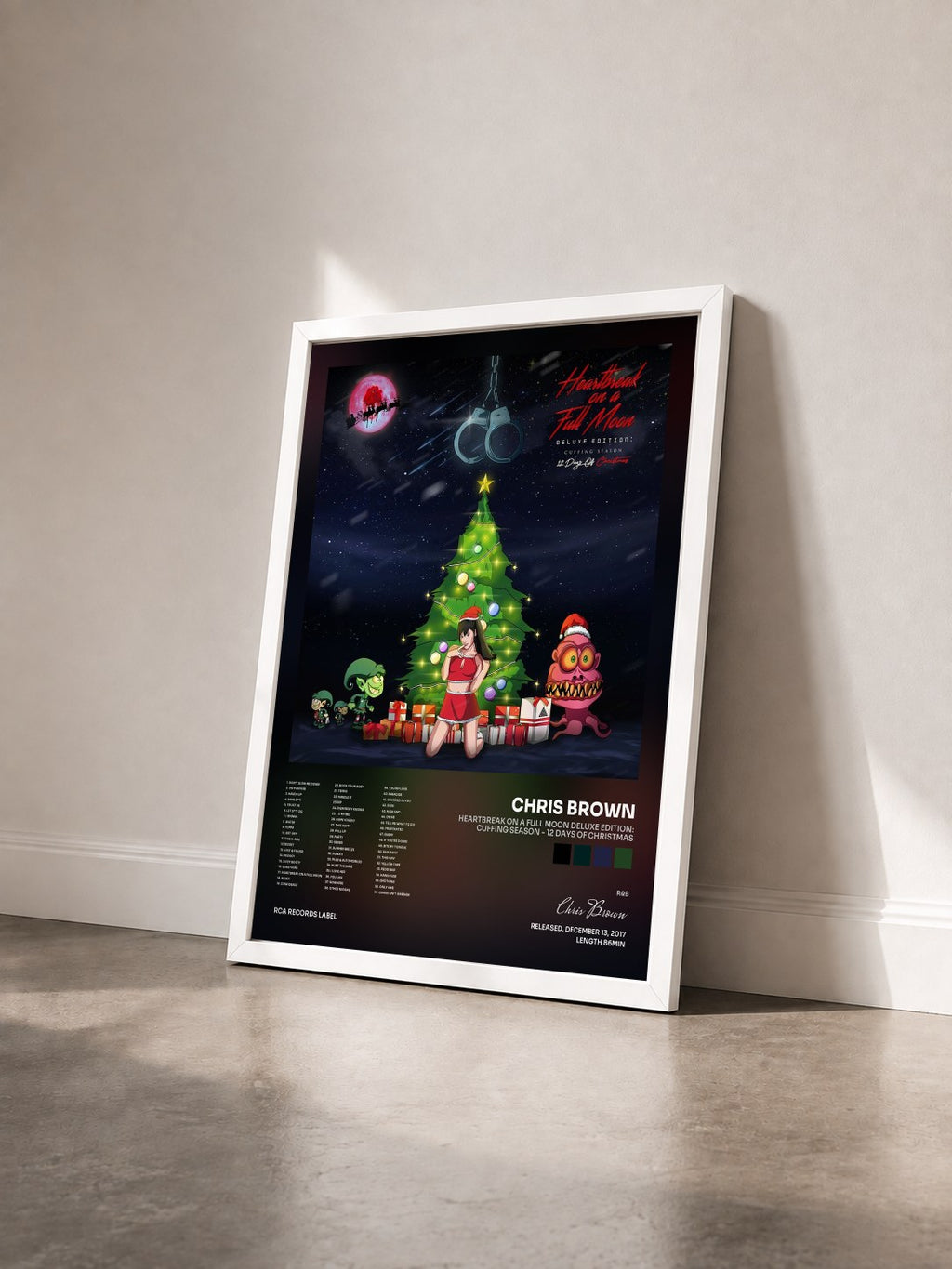 #blanc Heartbreak On A Full Moon Deluxe Edition: Cuffing Season - 12 Days Of Christmas by Chris Brown as a framed art print seen at an angle, white frame