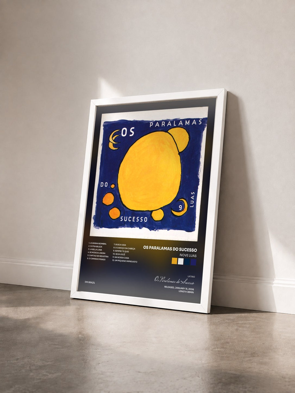 #blanc Tableau de l'album Nove Luas de Os Paralamas do Sucesso vu de trois quarts, cadre blanc