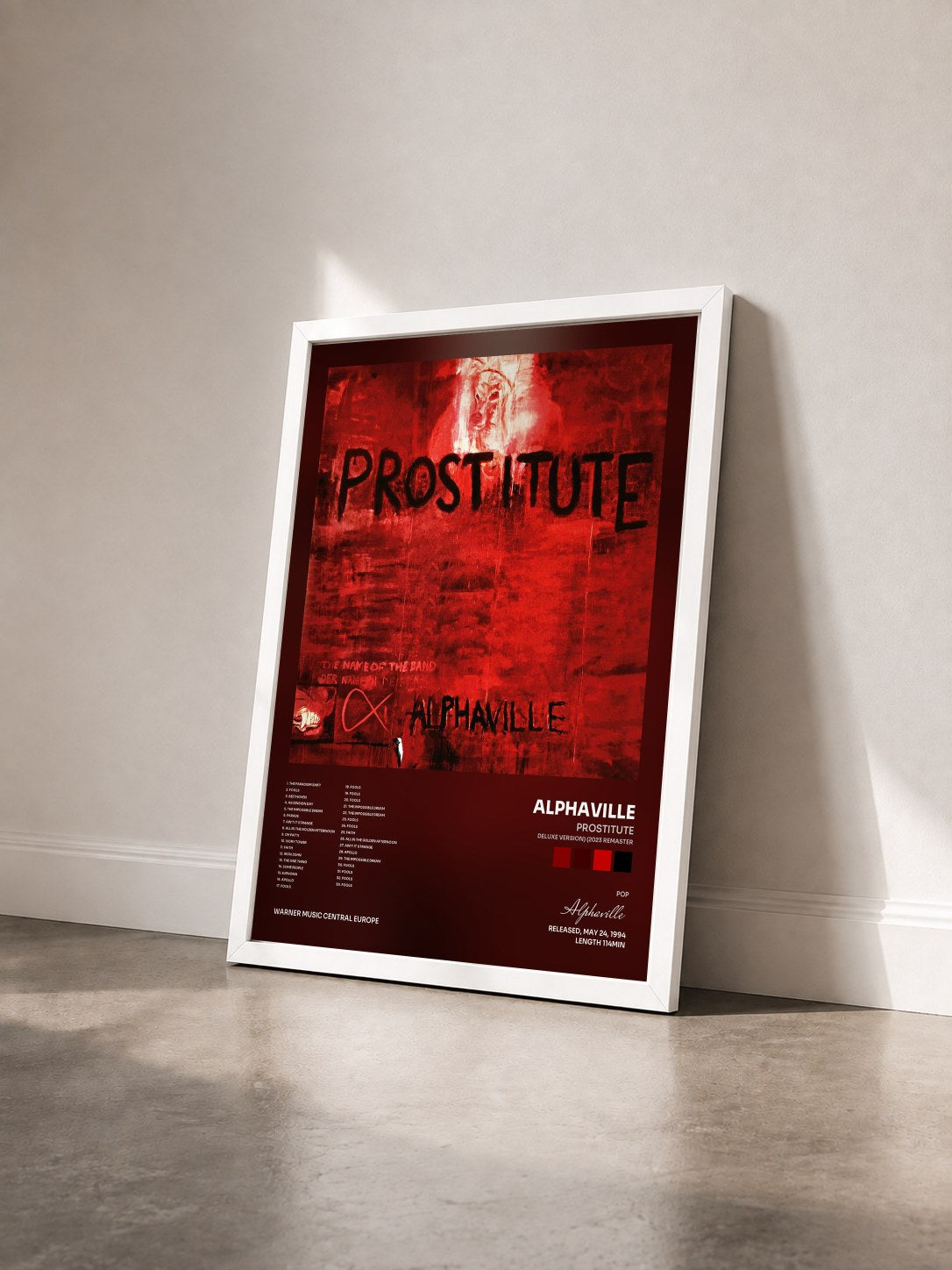 #blanc Tableau de l'album Prostitute (Deluxe Version) (2023 Remaster) de Alphaville vu de trois quarts, cadre blanc