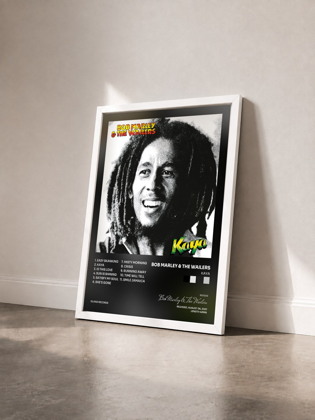 #blanc Kaya by Bob Marley & The Wailers as a framed art print seen at an angle, white frame