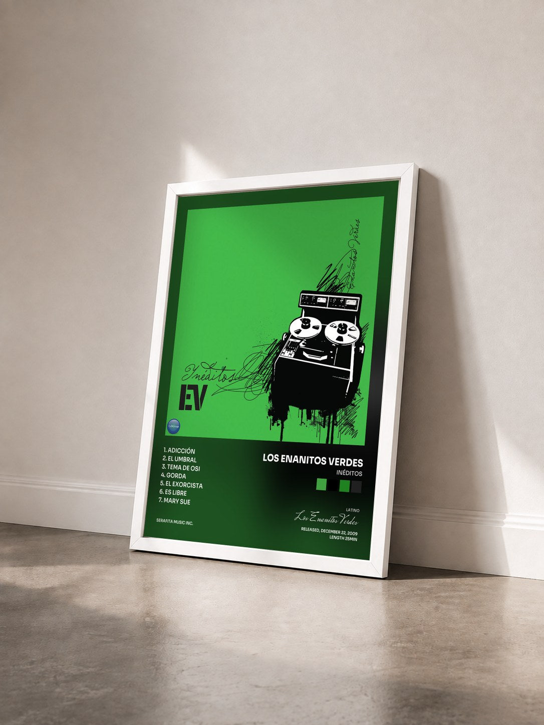 #blanc Tableau de l'album Inéditos de Los Enanitos Verdes vu de trois quarts, cadre blanc