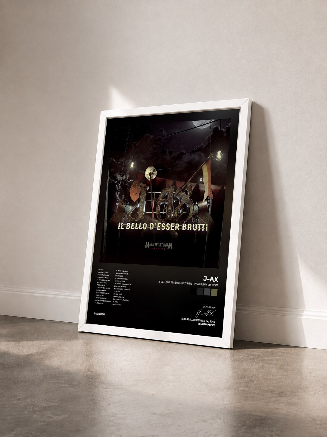 #blanc Tableau de l'album Il bello d'esser brutti Multiplatinum Edition de J-AX vu de trois quarts, cadre blanc