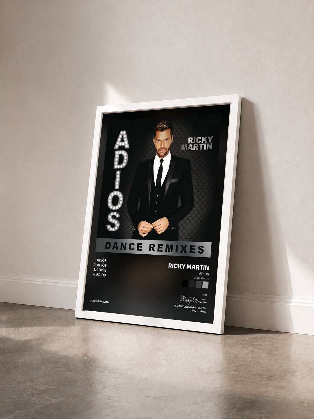#blanc Adiós (Dance Remixes) by Ricky Martin as a framed art print seen at an angle, white frame