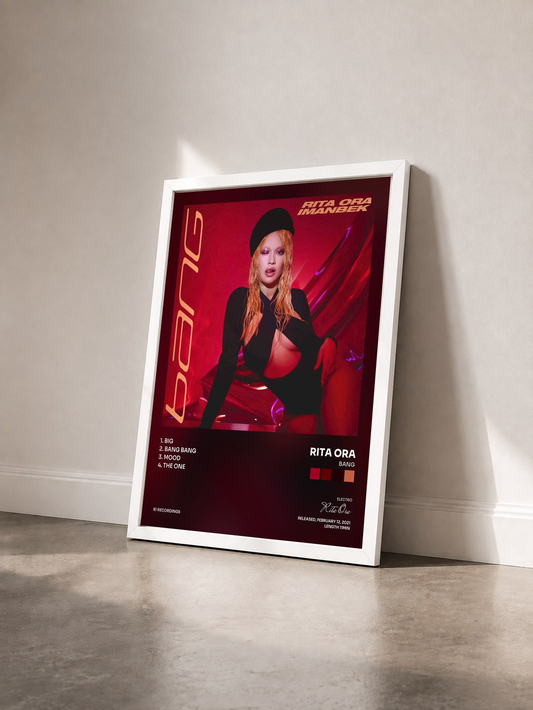 #blanc Bang by Rita Ora as a framed art print seen at an angle, white frame