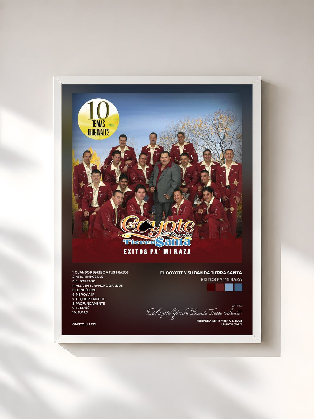 #blanc Exitos Pa' Mi Raza by El Coyote Y Su Banda Tierra Santa as a framed art print, white frame, printed and framed in France
