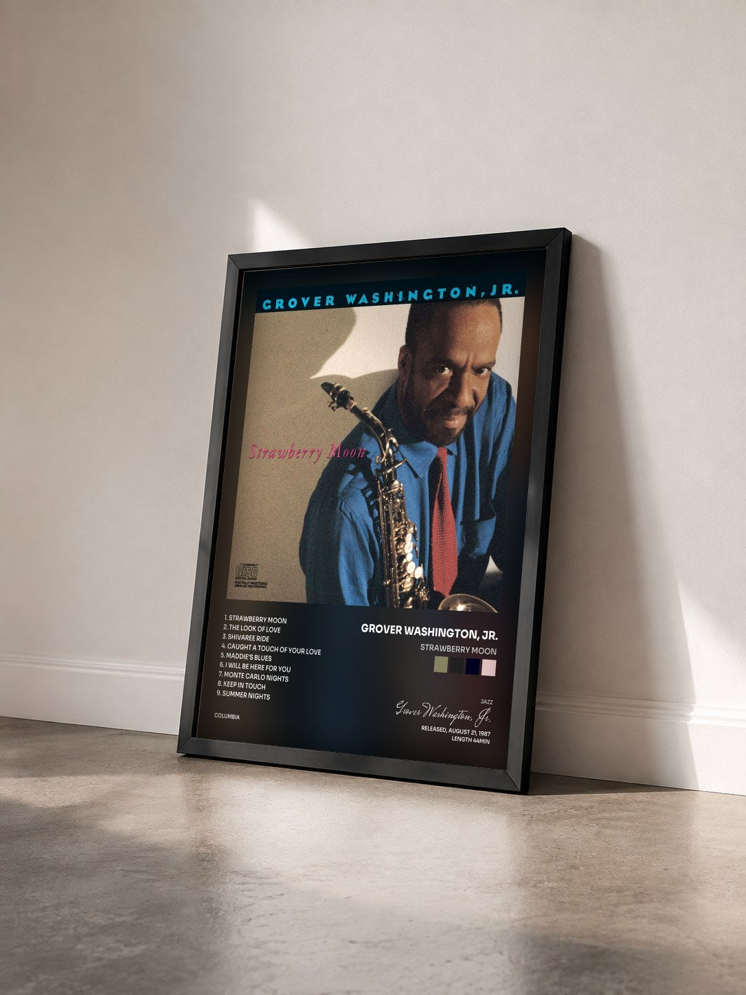#noir Tableau de l'album Strawberry Moon de Grover Washington, Jr. vu de trois quarts, cadre noir