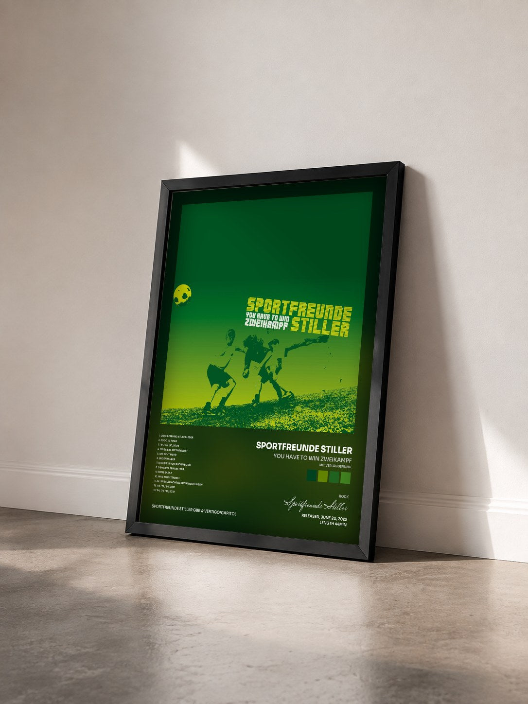 #noir Tableau de l'album You Have To Win Zweikampf (mit Verlängerung) de Sportfreunde Stiller vu de trois quarts, cadre noir