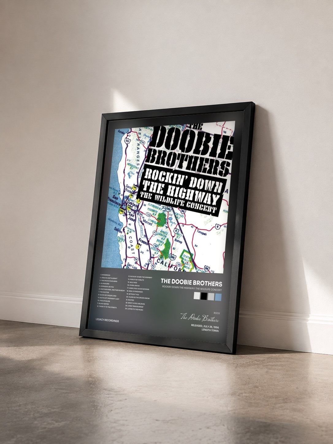 #noir Tableau de l'album Rockin' Down The Highway: The Wildlife Concert de The Doobie Brothers vu de trois quarts, cadre noir