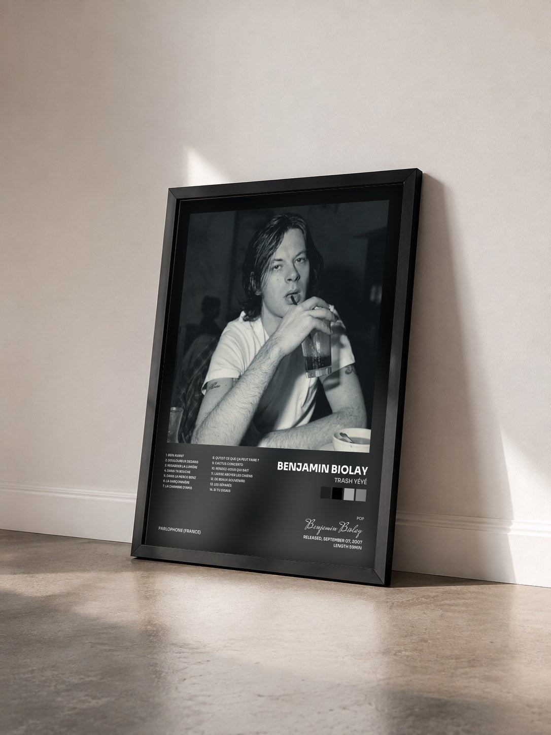 #noir Trash yéyé by Benjamin Biolay as a framed art print seen at an angle, black frame