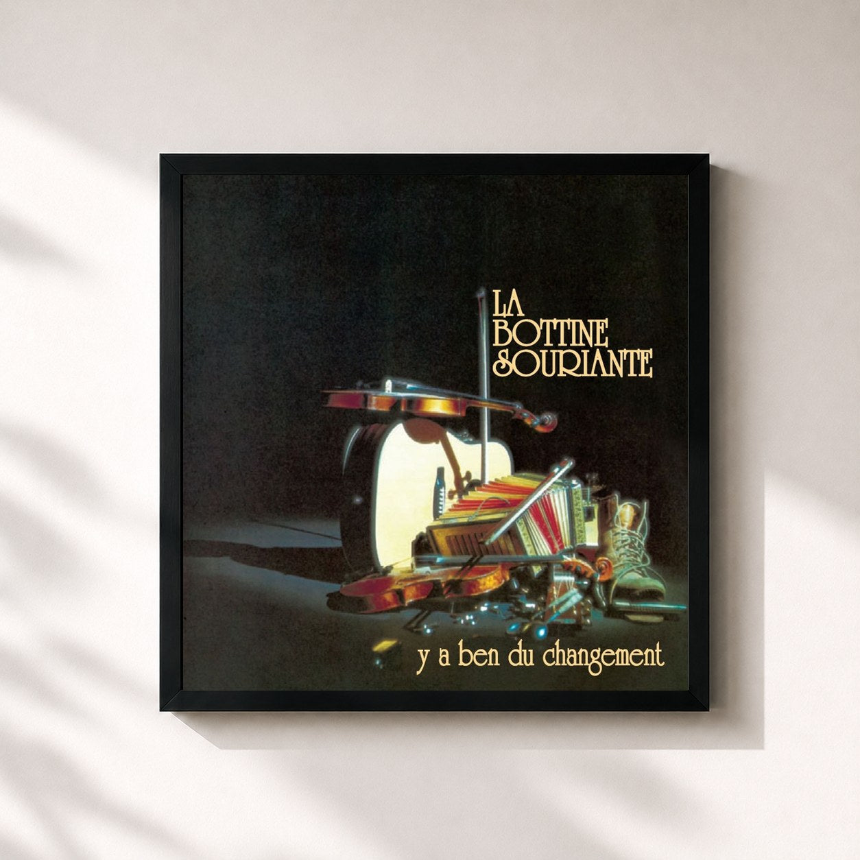 #noir Tableau carré de l'album Y'a ben du changement de La Bottine Souriante, cadre noir 32x32 cm