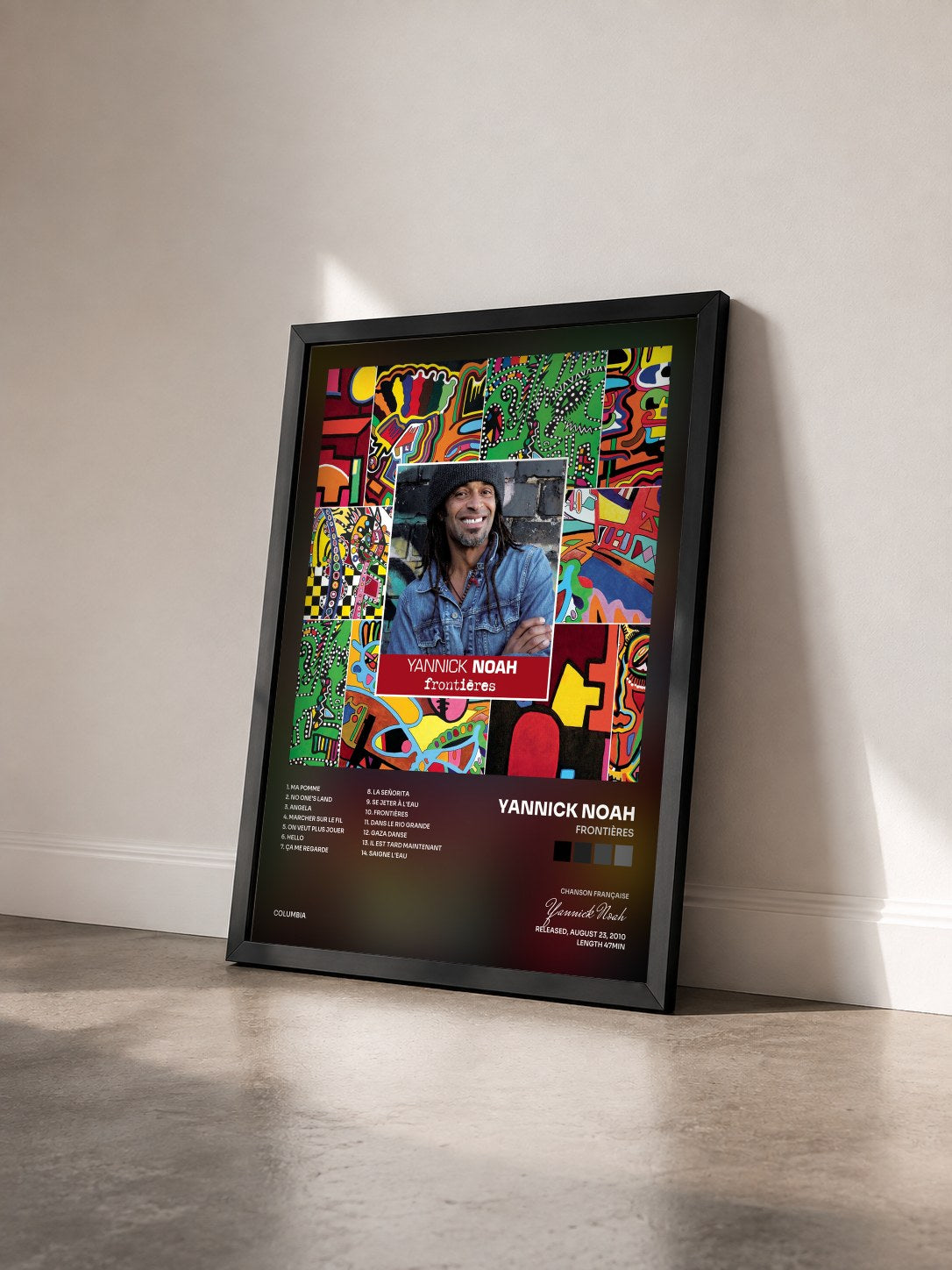 #noir Tableau de l'album Frontières de Yannick Noah vu de trois quarts, cadre noir