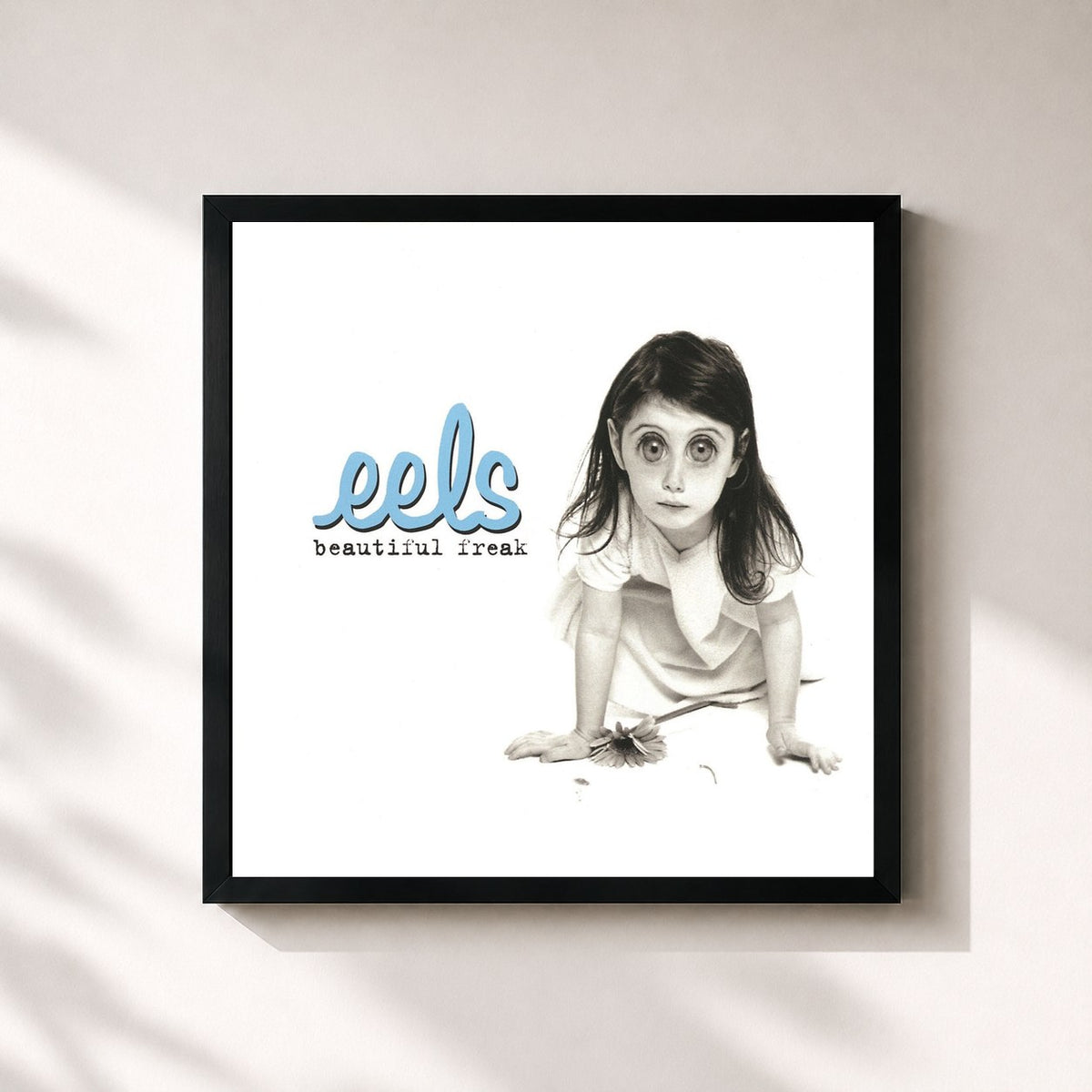 #noir Beautiful Freak de Eels en lámina cuadrada enmarcada, marco negro de 32x32 cm