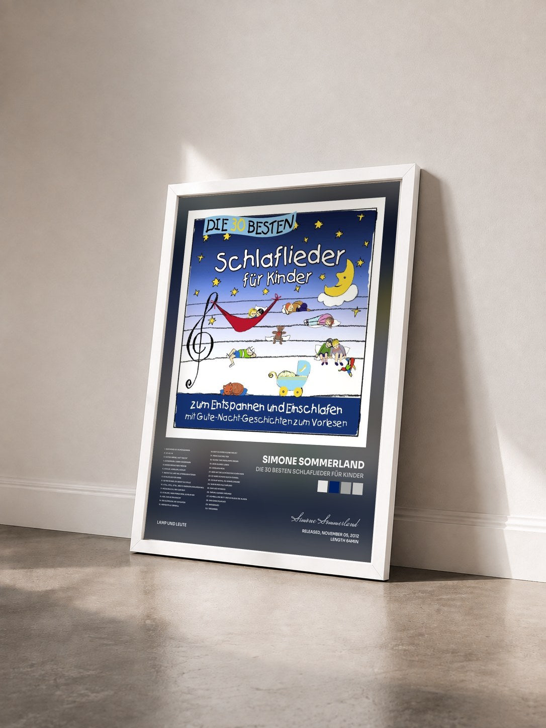 #blanc Tableau de l'album Die 30 besten Schlaflieder für Kinder de Simone Sommerland vu de trois quarts, cadre blanc