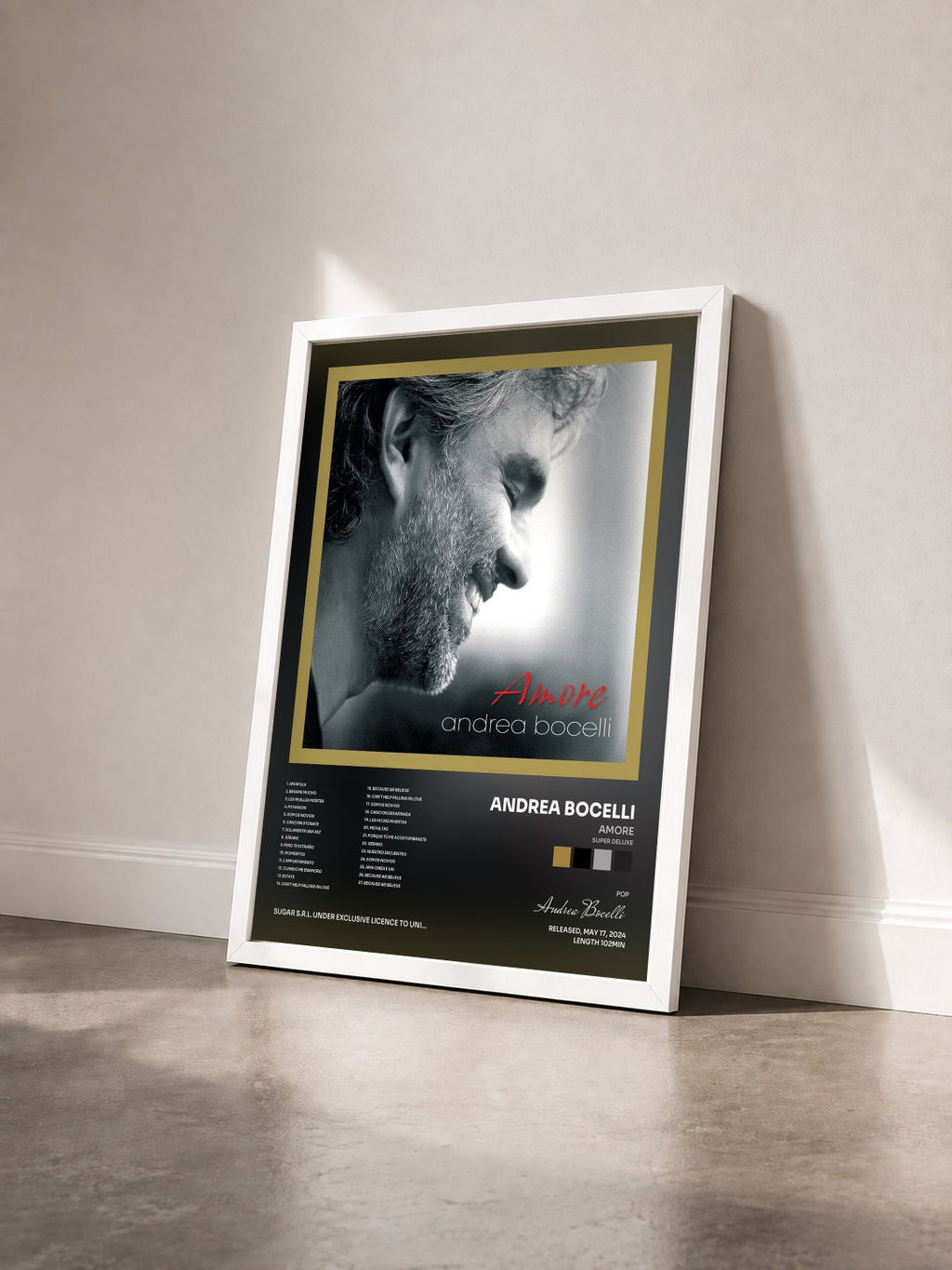 #blanc Tableau de l'album Amore (Super Deluxe) de Andrea Bocelli vu de trois quarts, cadre blanc