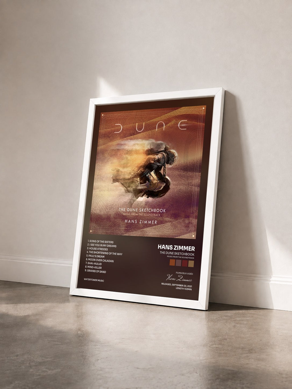 #blanc Tableau de l'album The Dune Sketchbook (Music from the Soundtrack) de Hans Zimmer vu de trois quarts, cadre blanc