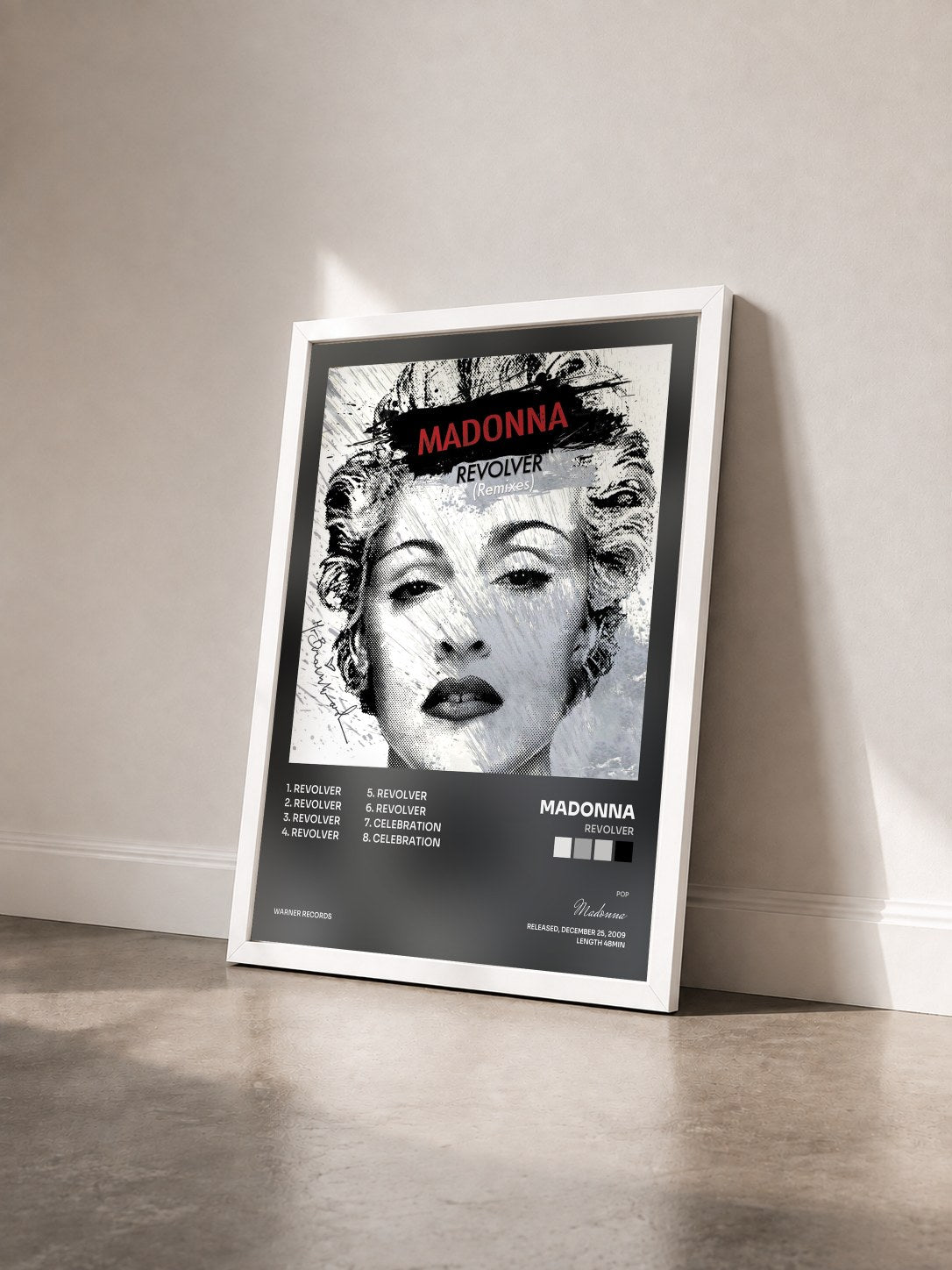 #blanc Tableau de l'album Revolver de Madonna vu de trois quarts, cadre blanc