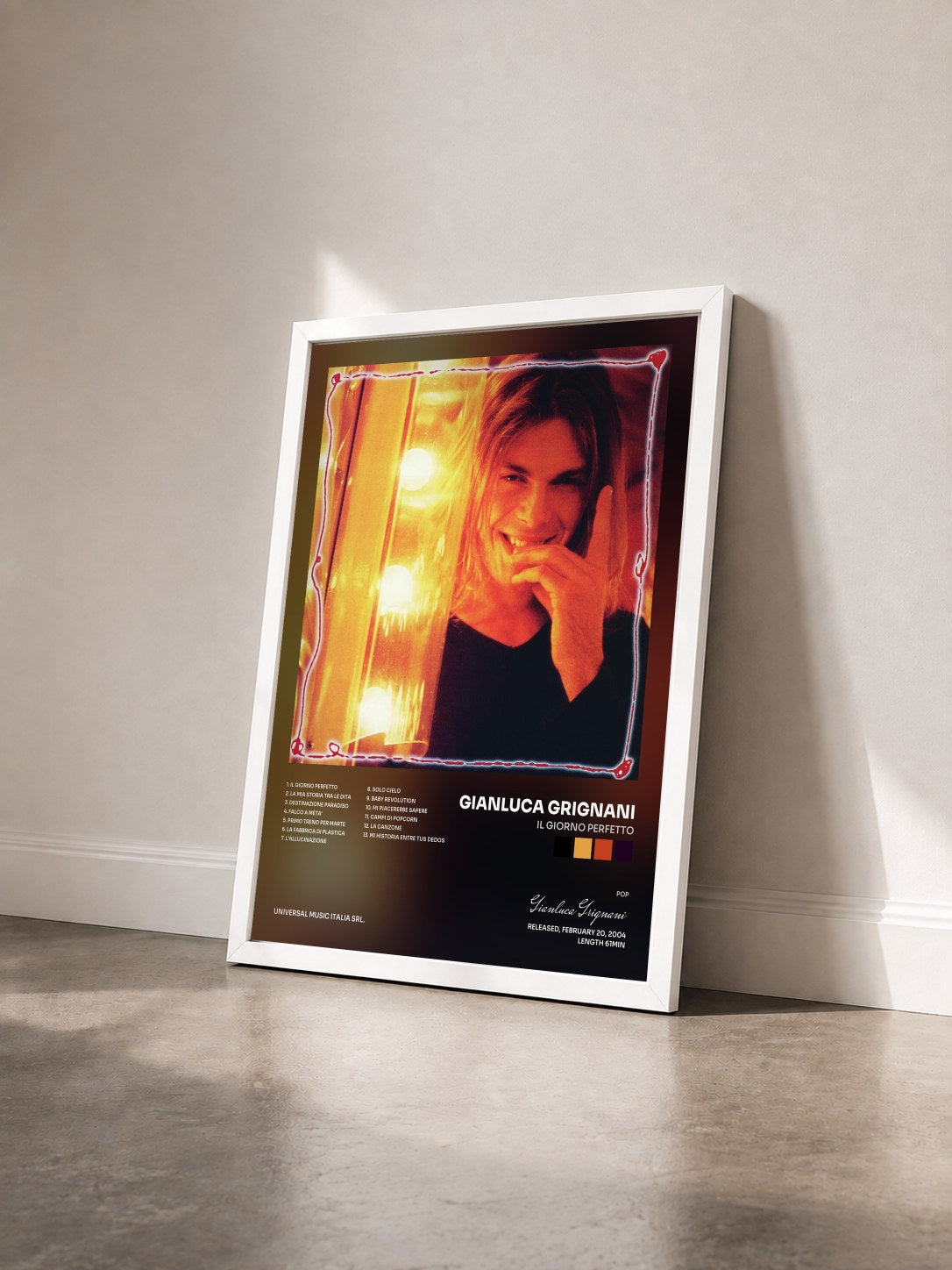 #blanc Tableau de l'album Il Giorno Perfetto de Gianluca Grignani vu de trois quarts, cadre blanc