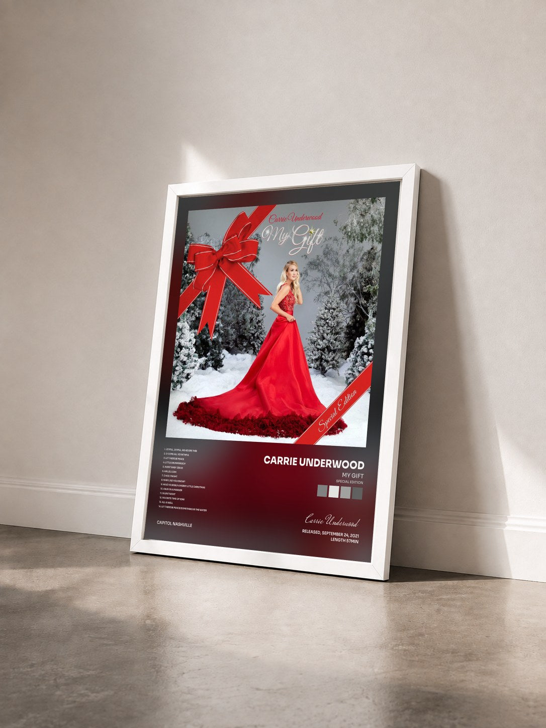 #blanc Tableau de l'album My Gift (Special Edition) de Carrie Underwood vu de trois quarts, cadre blanc