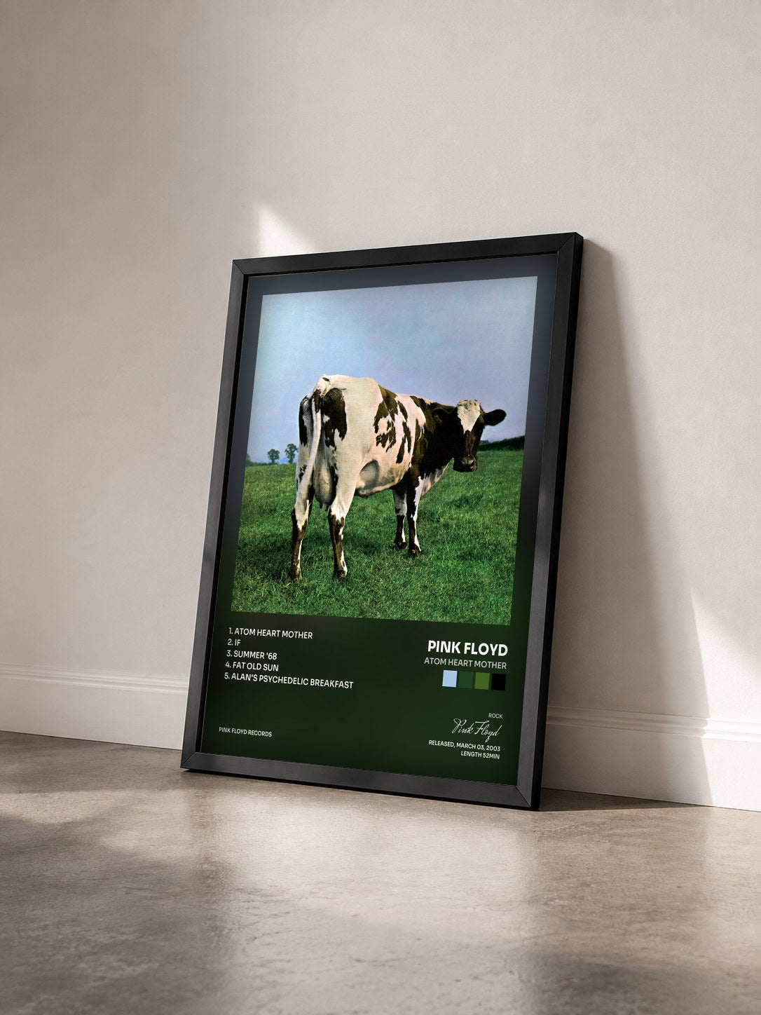#noir Tableau de l'album Atom Heart Mother de Pink Floyd vu de trois quarts, cadre noir