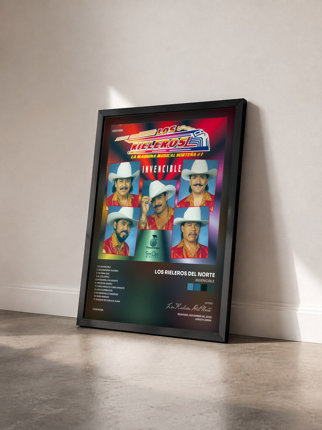 #noir Tableau de l'album Invencible de Los Rieleros Del Norte vu de trois quarts, cadre noir